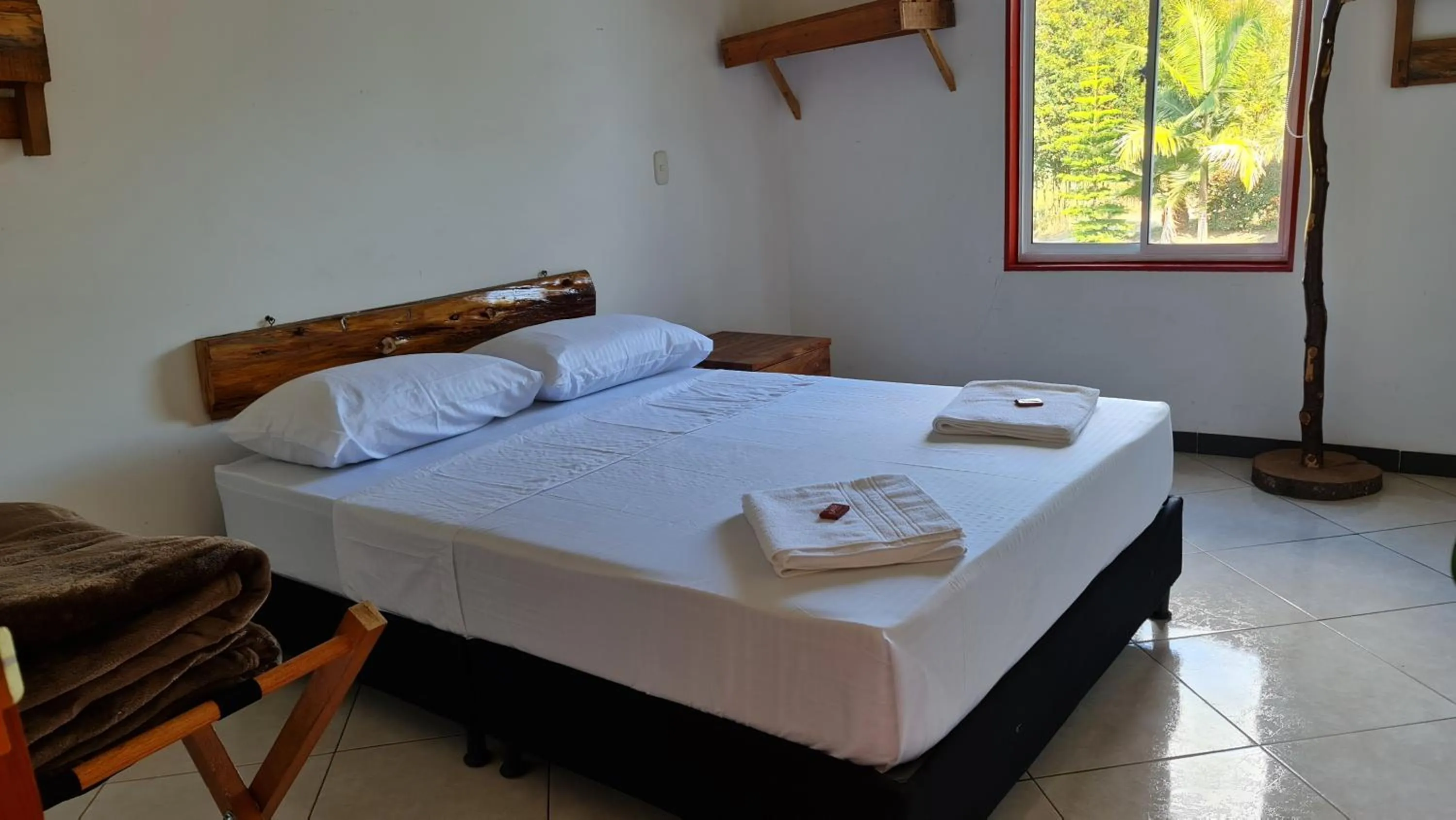 Bed in HOSTERÍA BRISAS DEL RÍO