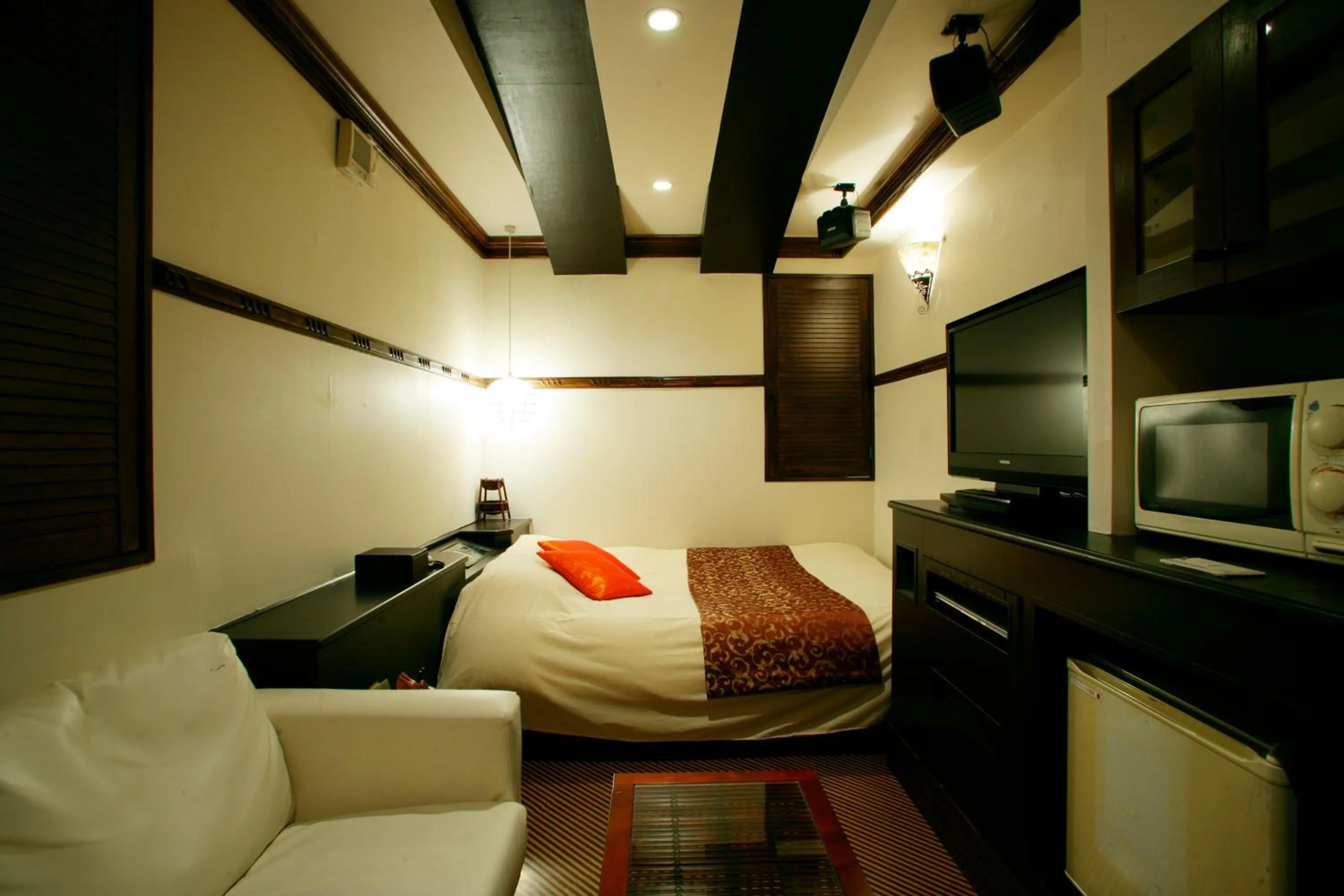 Bed in HOTEL CHECK INN BALI adult only