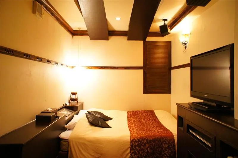 Bed in HOTEL CHECK INN BALI adult only