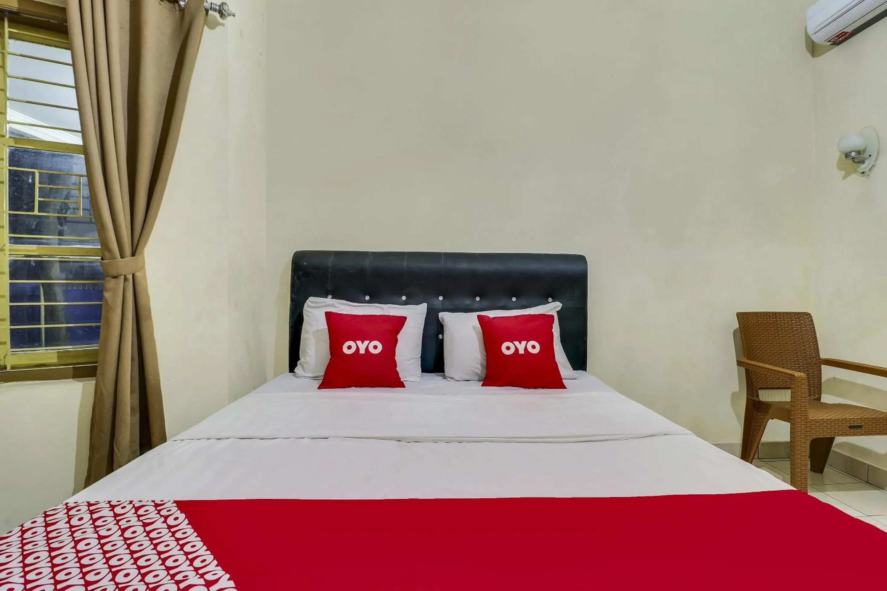 Bedroom in Hotel O My Guest House Syariah