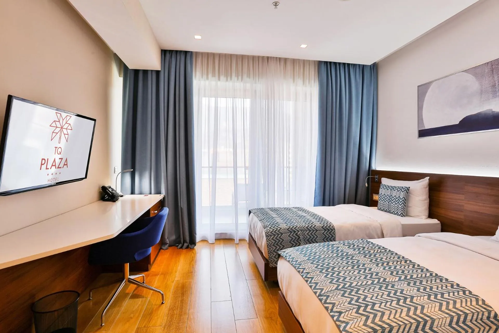 Bed in Hotel TQ Plaza