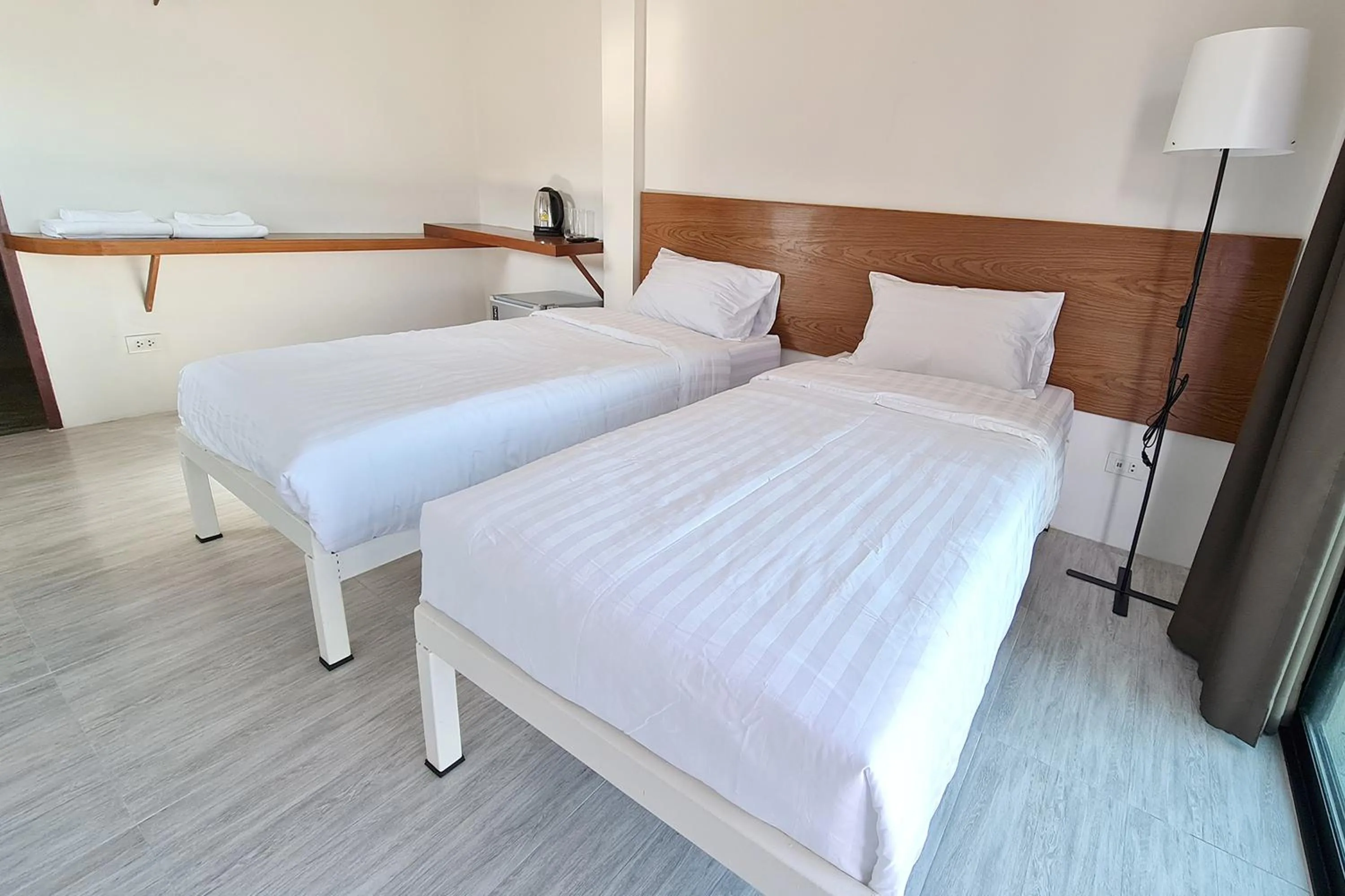 Bed in Phorpun Resort Lampang