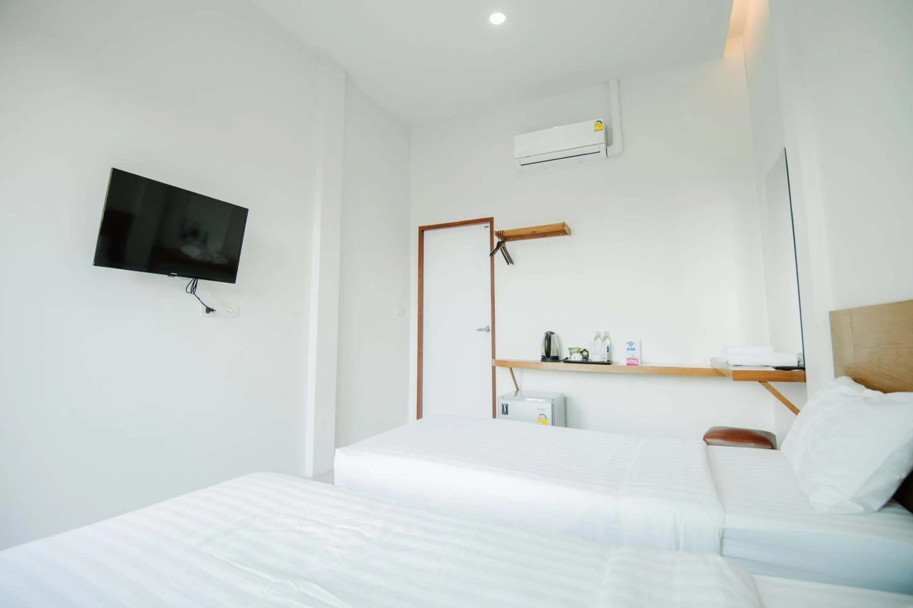 Bed in Phorpun Resort Lampang