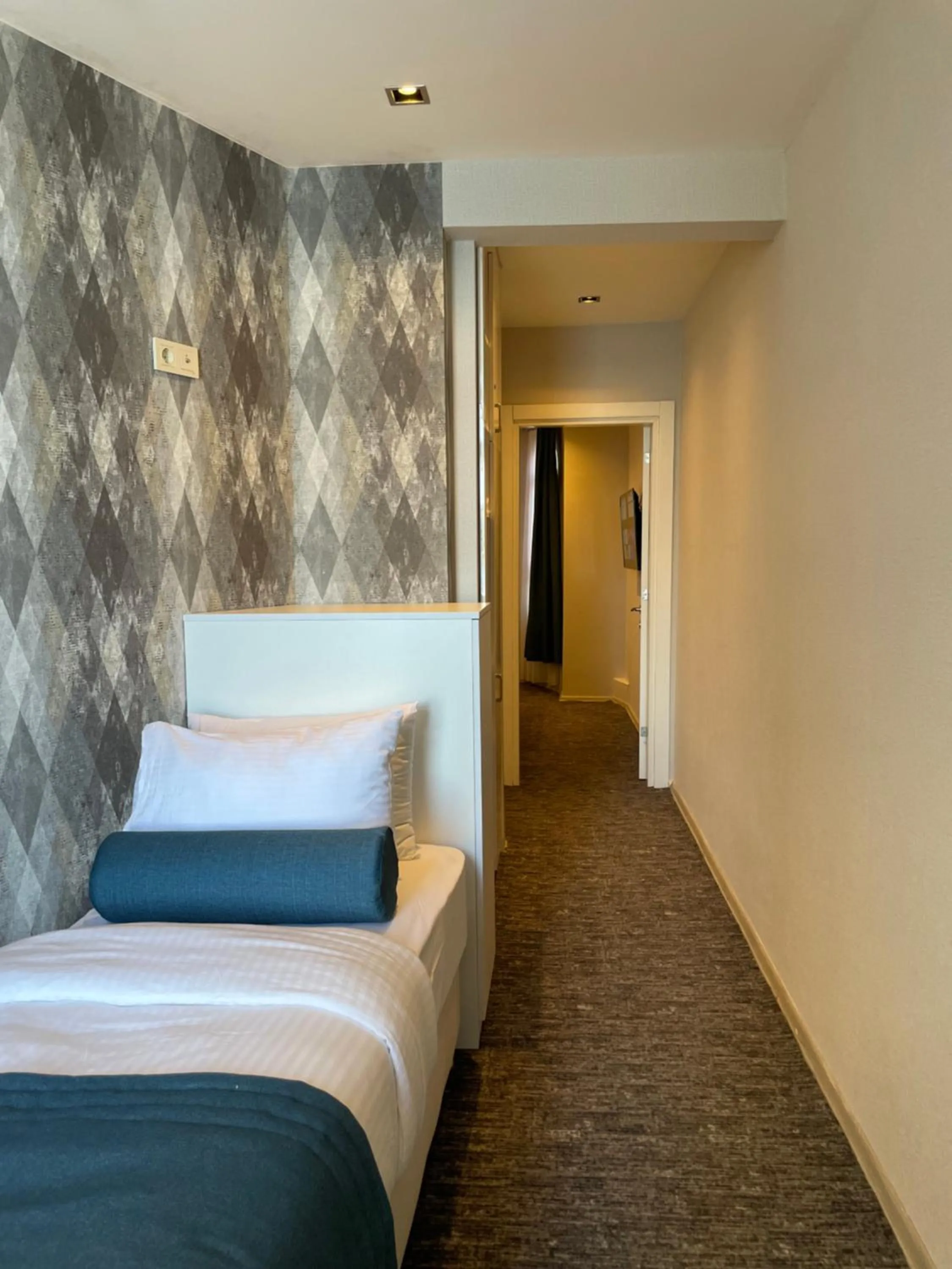 Bed in Weingart Seaside Hotel