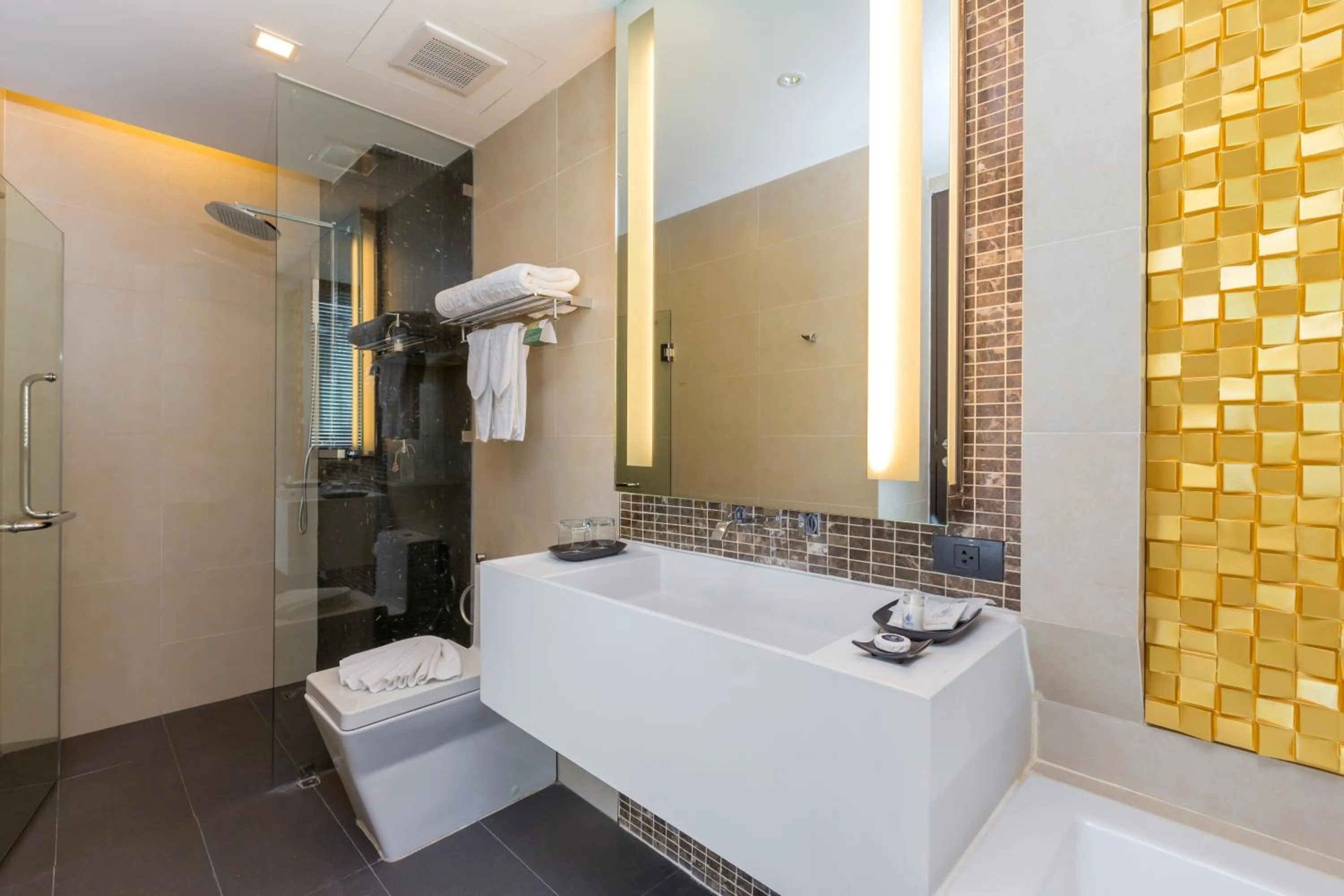 Bathroom in The Charm Resort Phuket - SHA Certified