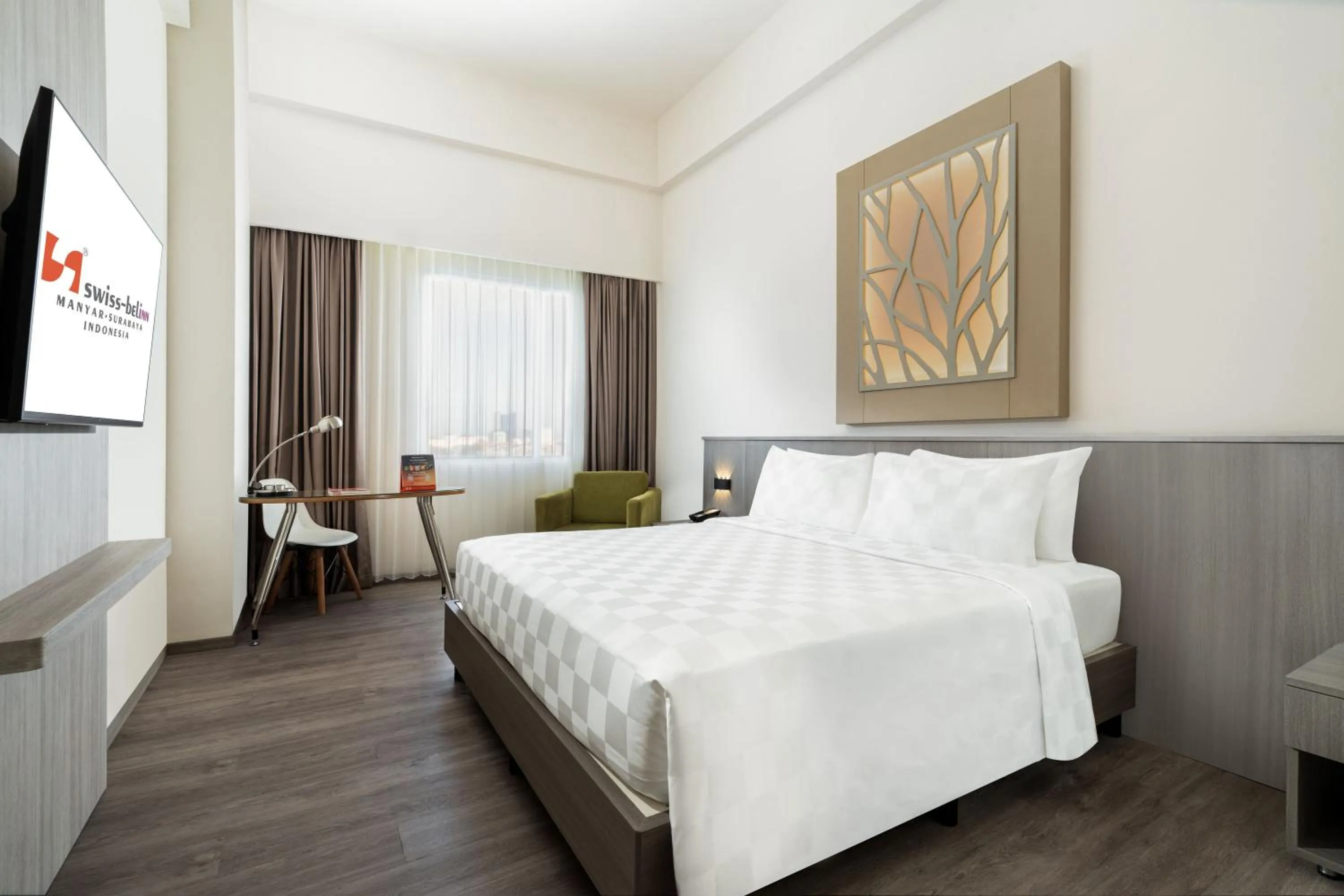 Bed in Swiss-Belinn Manyar