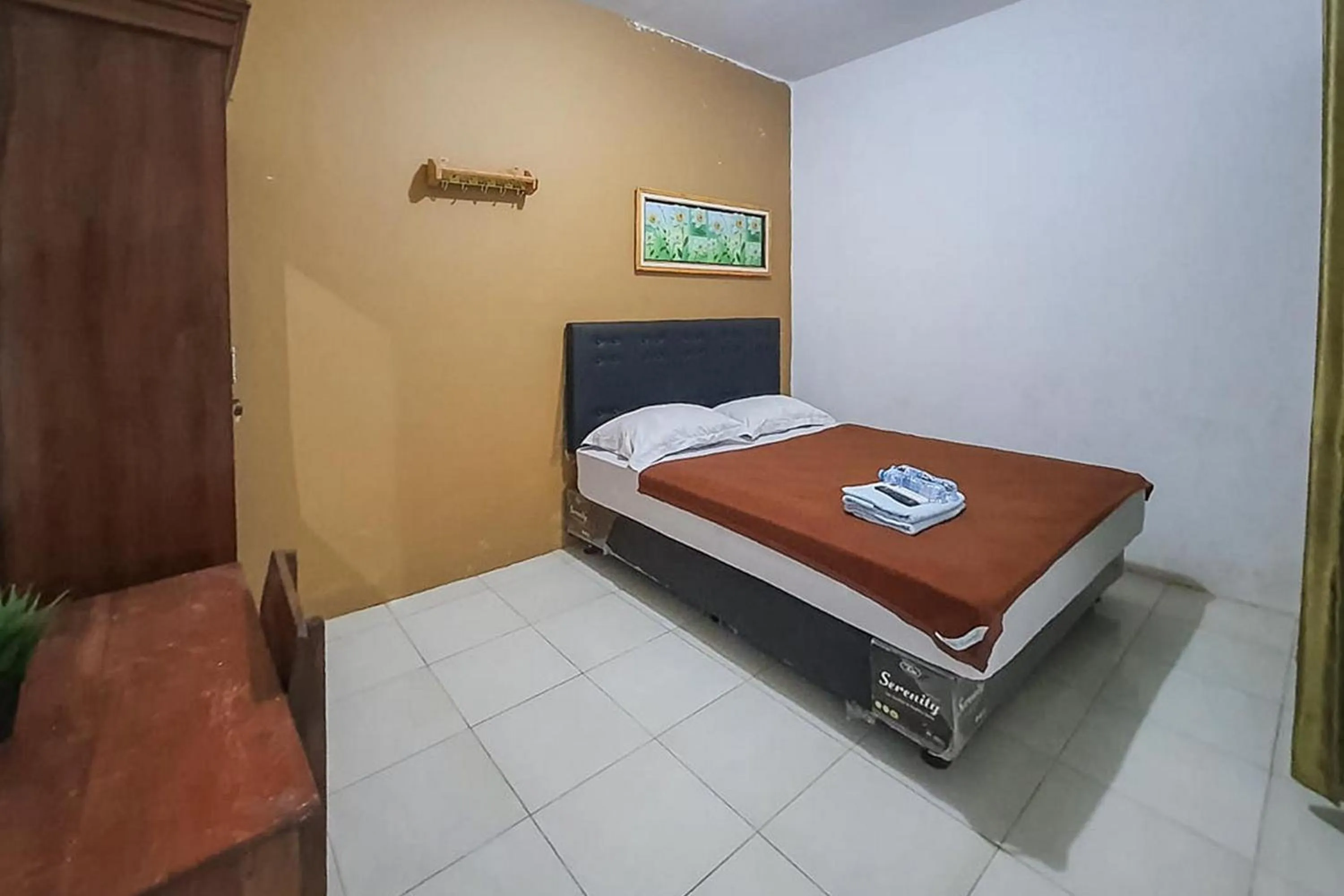 Bed in Syafa Homestay Syariah Mitra RedDoorz