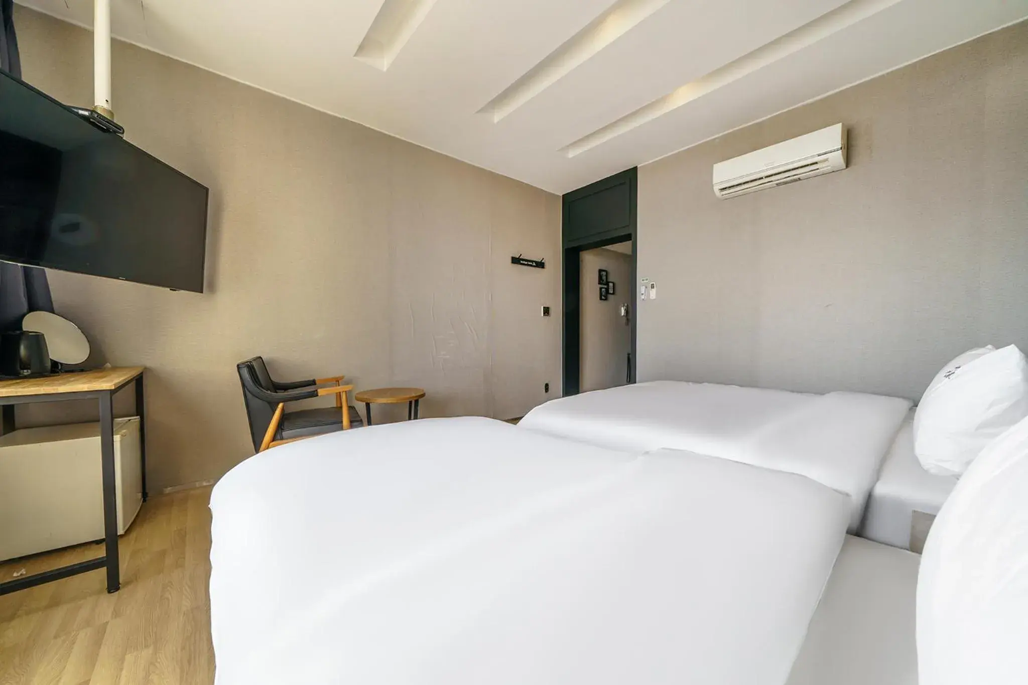 Bed in JK Hotel Bed in JK Hotel