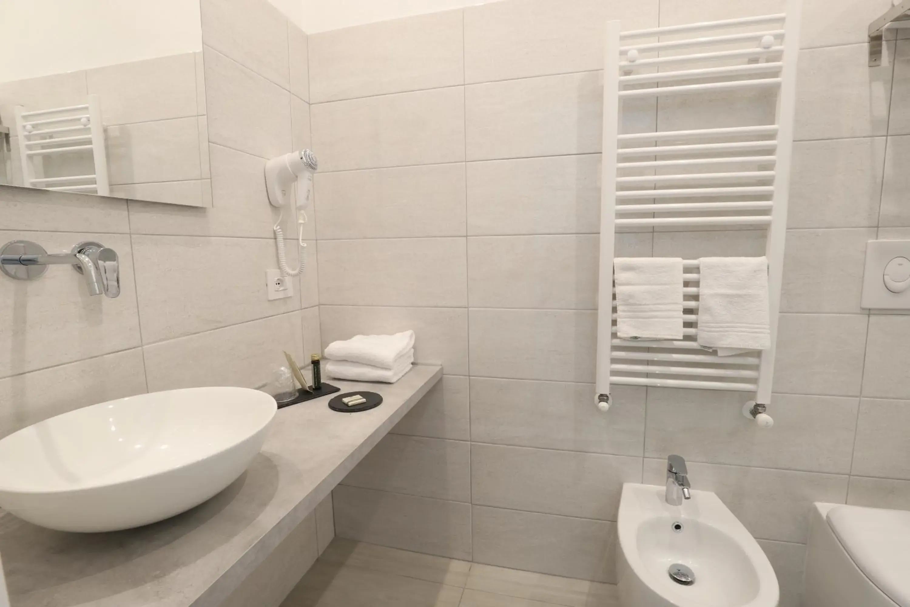 Bathroom in Cadorna Luxury Hotel Bathroom in Cadorna Luxury Hotel