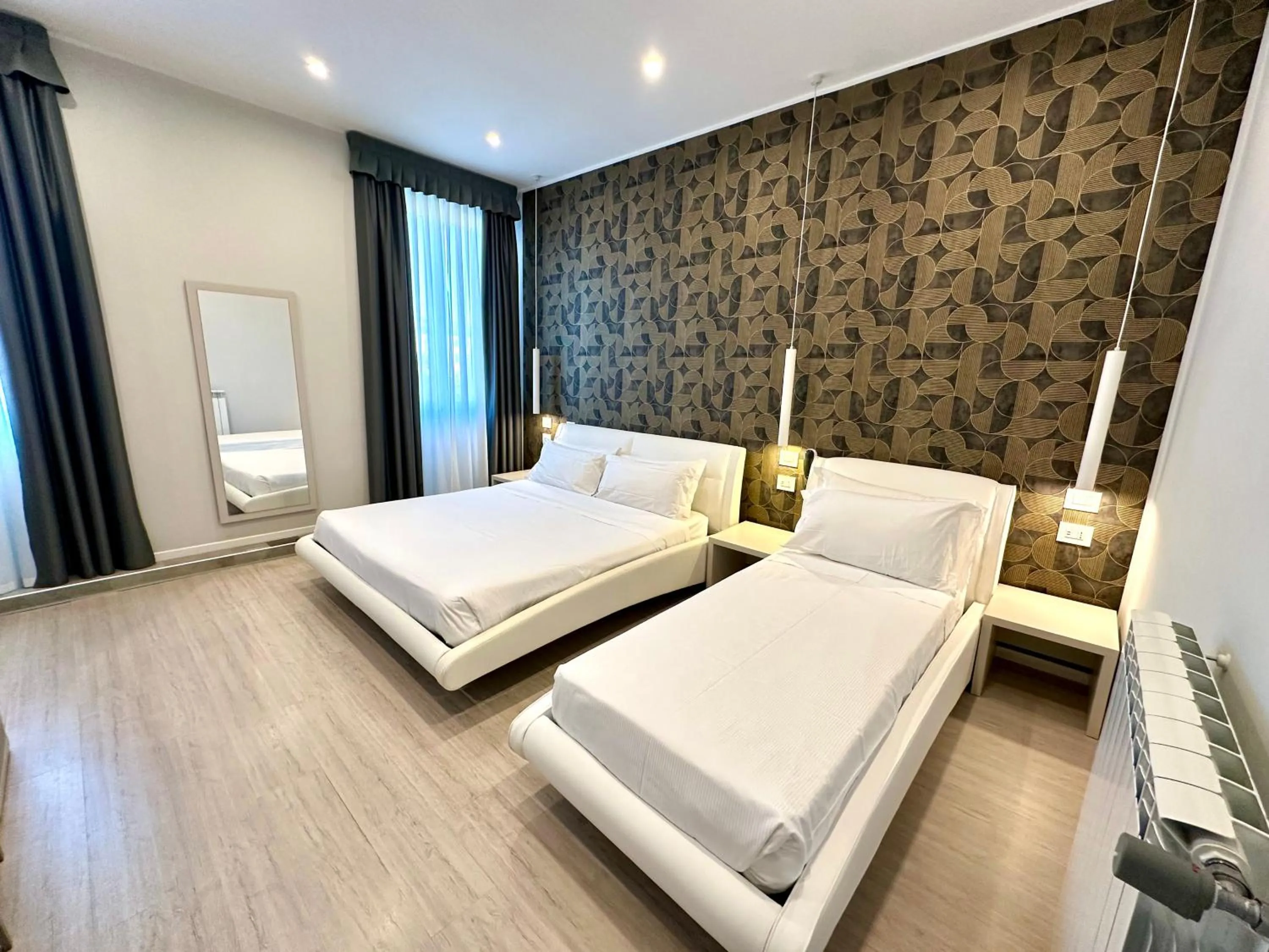 Bed in Cadorna Luxury Hotel