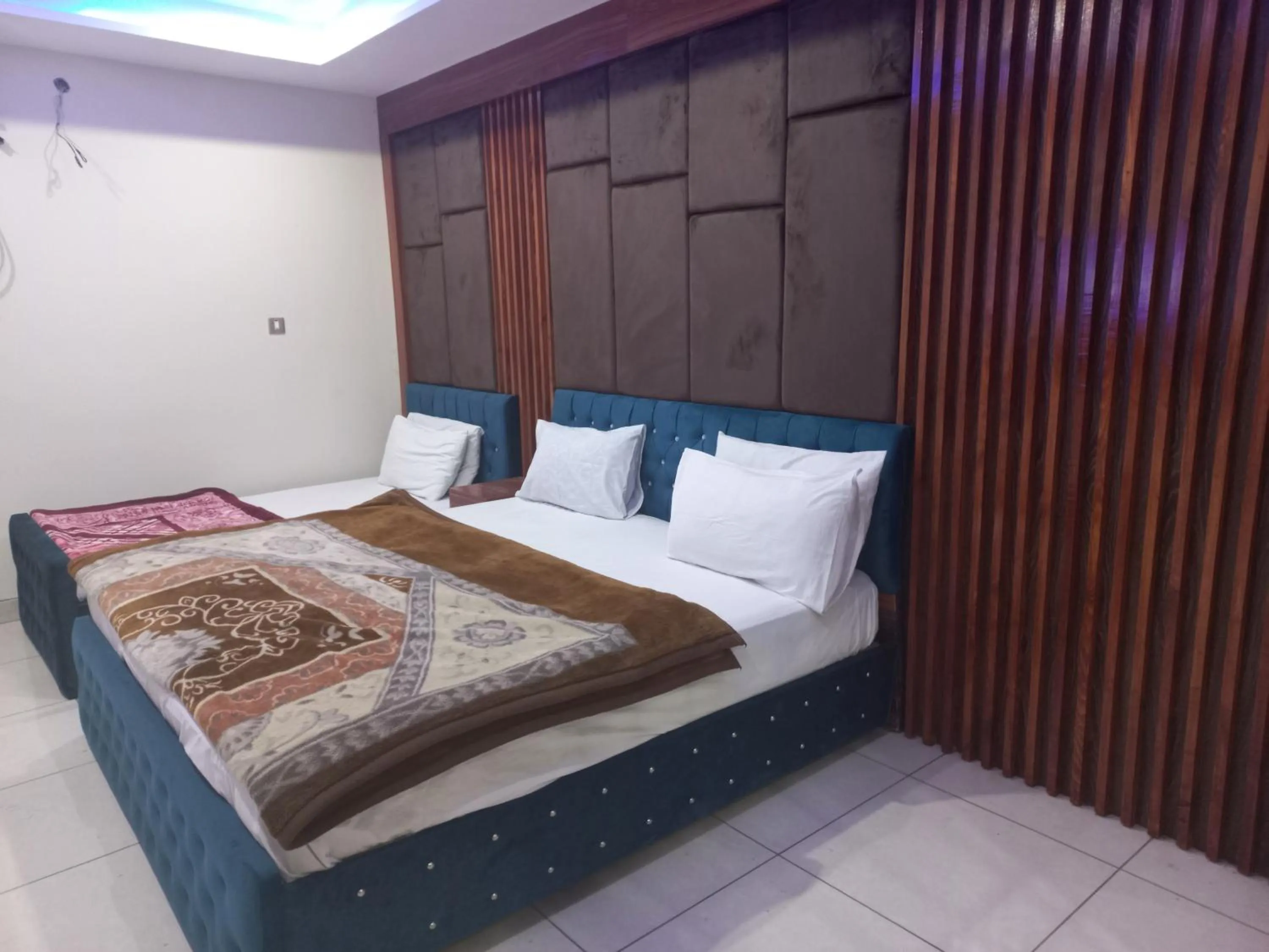 Bed in Hotel Executive One