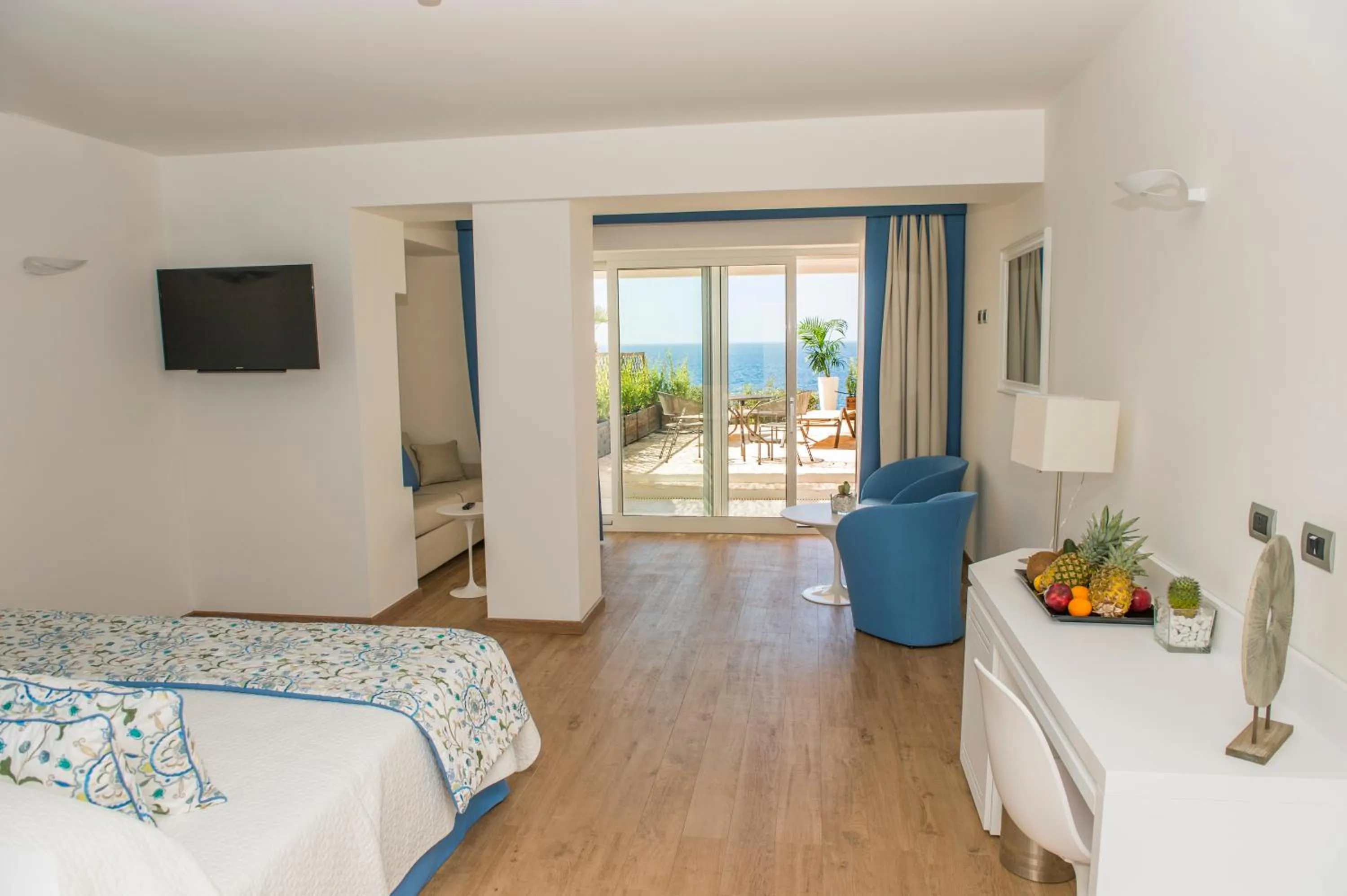 Photo of the whole room, Bed in El Faro Hotel & Spa