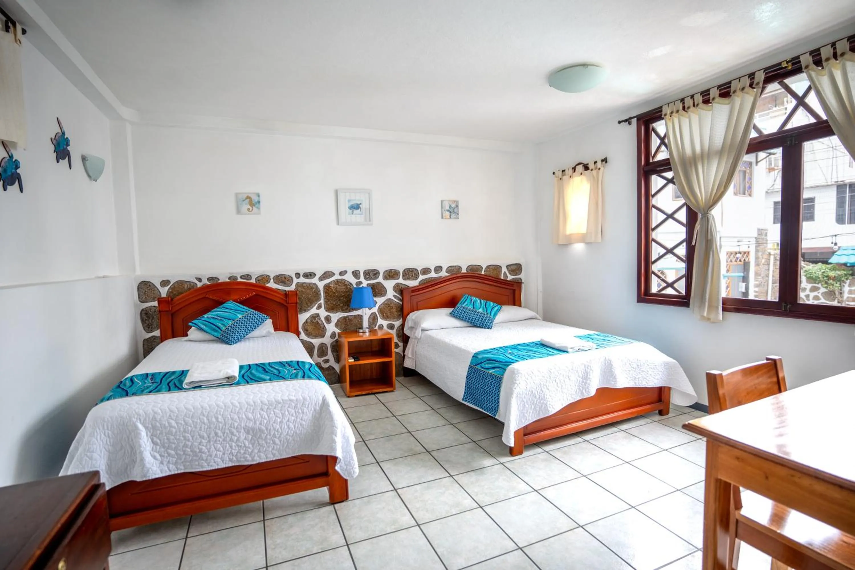 Bed in Maidith Galapagos Inn