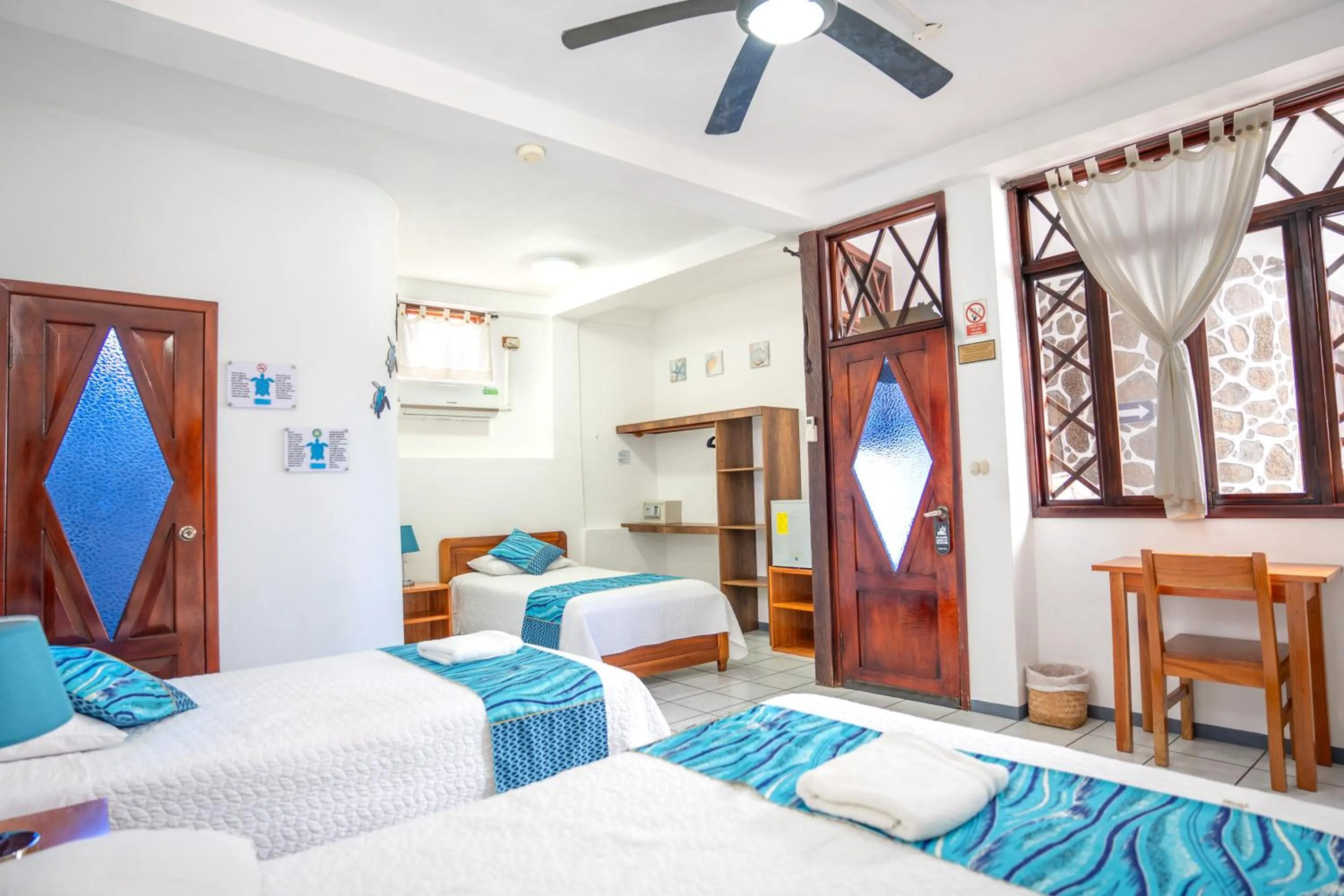 Bed in Maidith Galapagos Inn