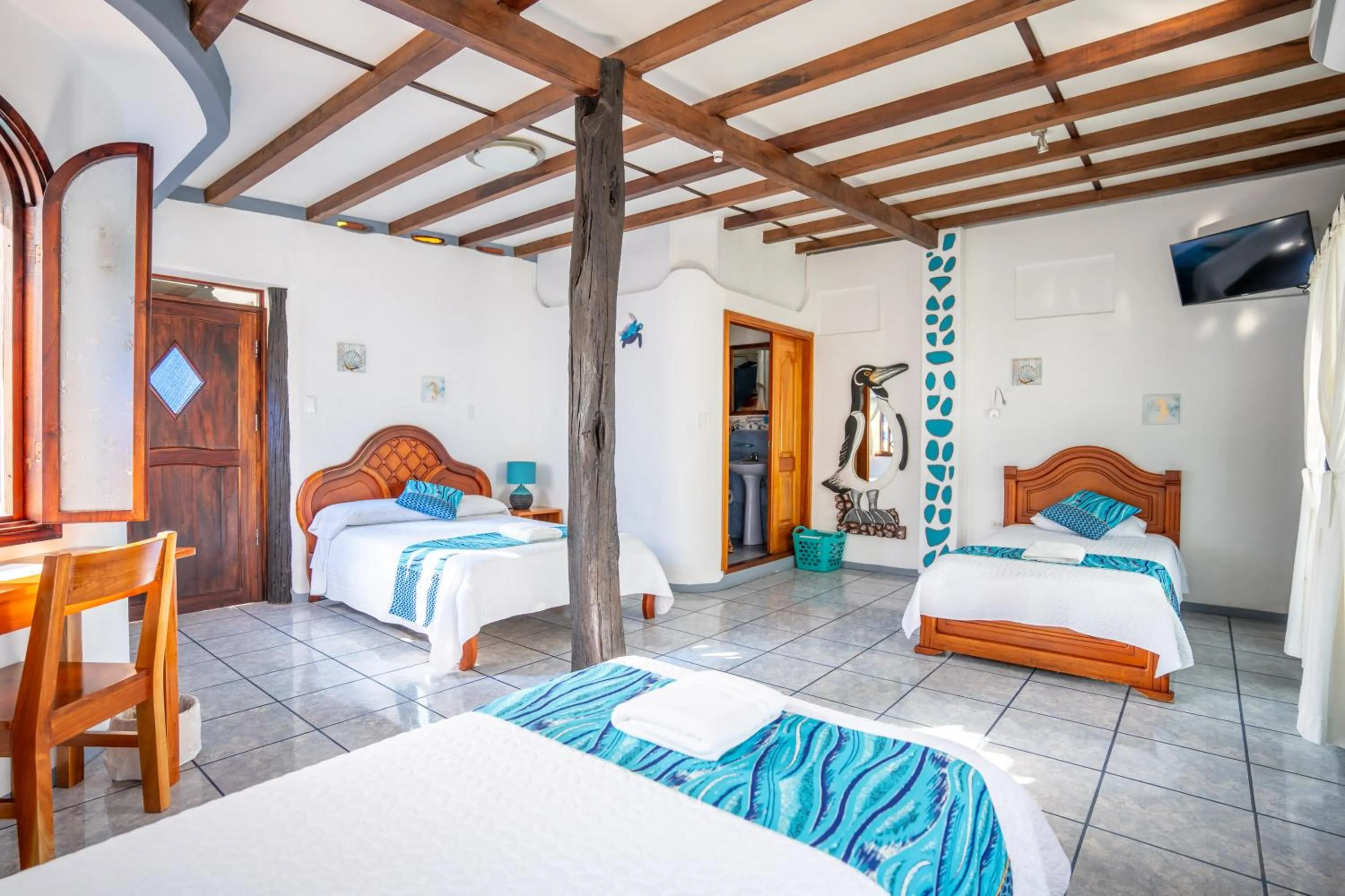 Bed in Maidith Galapagos Inn