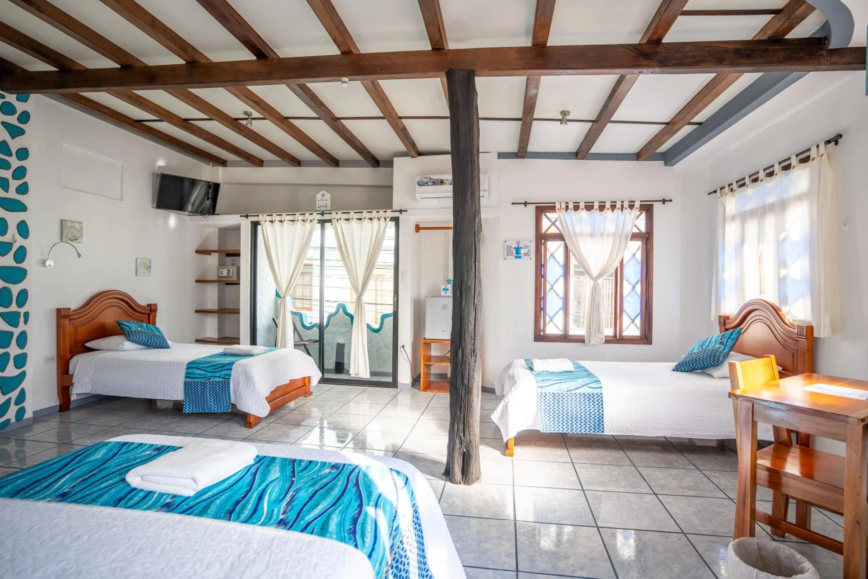 Bed in Maidith Galapagos Inn