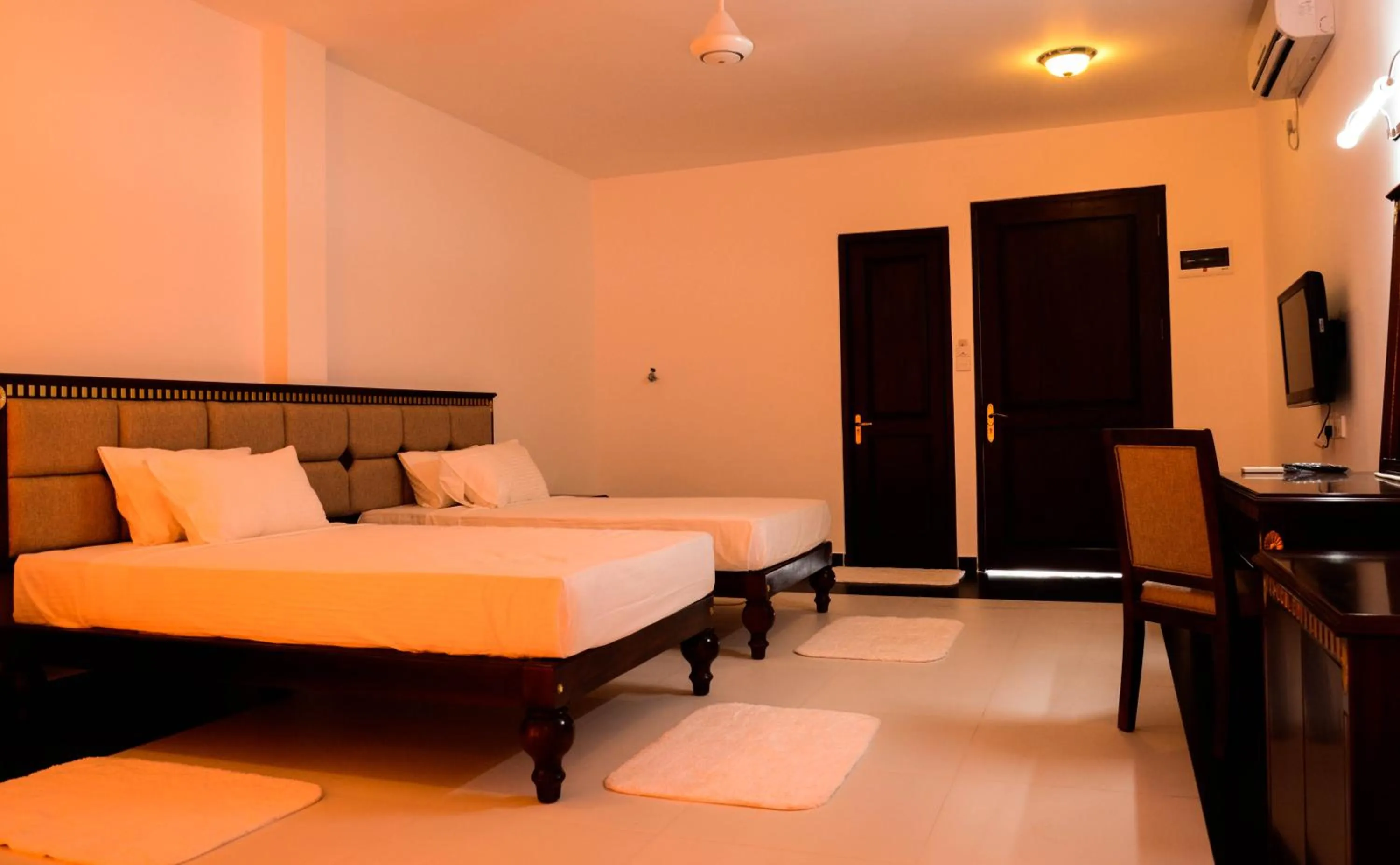 Bed in Marina Beach Passikudah