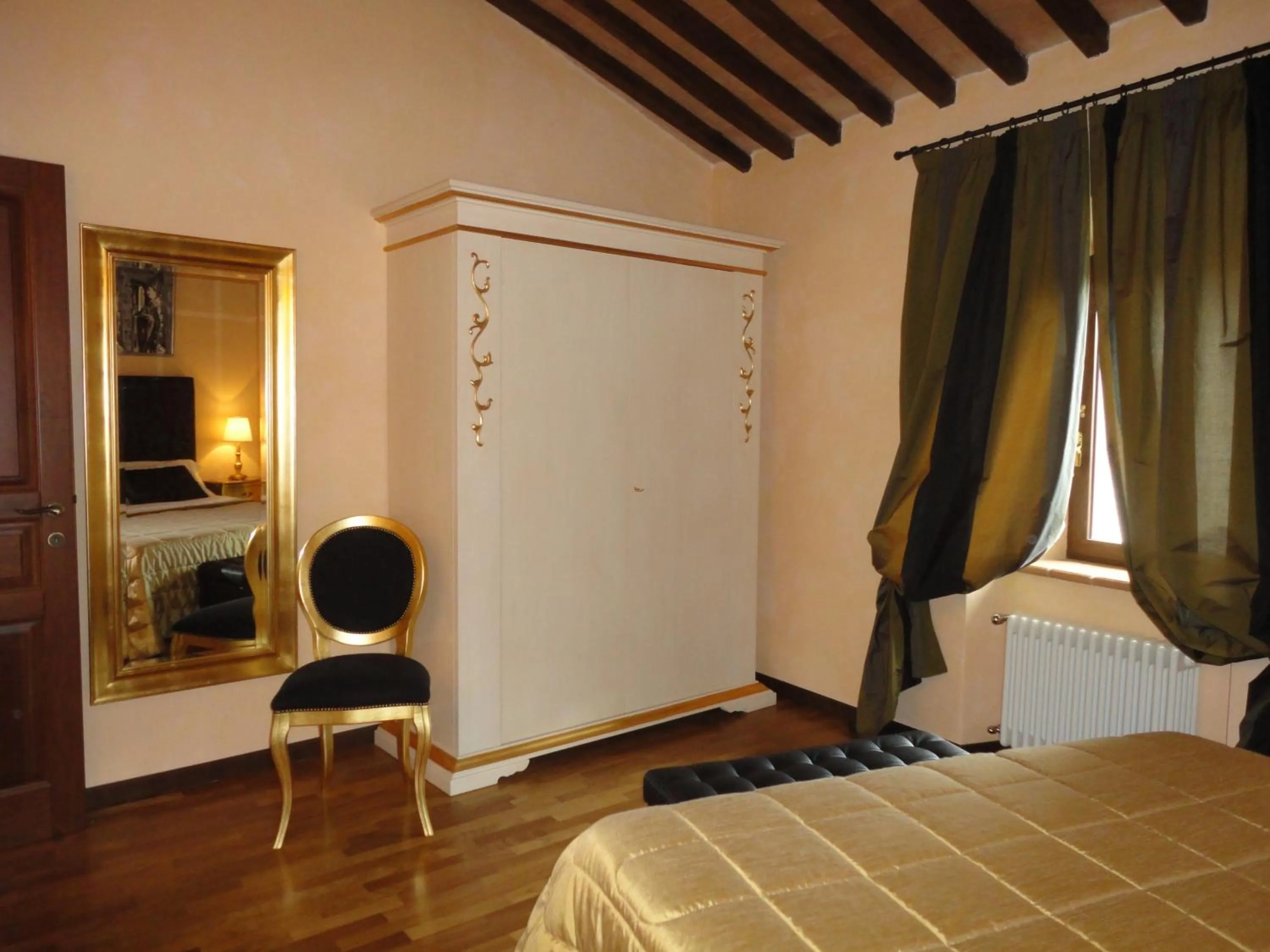 Photo of the whole room, Bed in Castello Izzalini Todi Resort