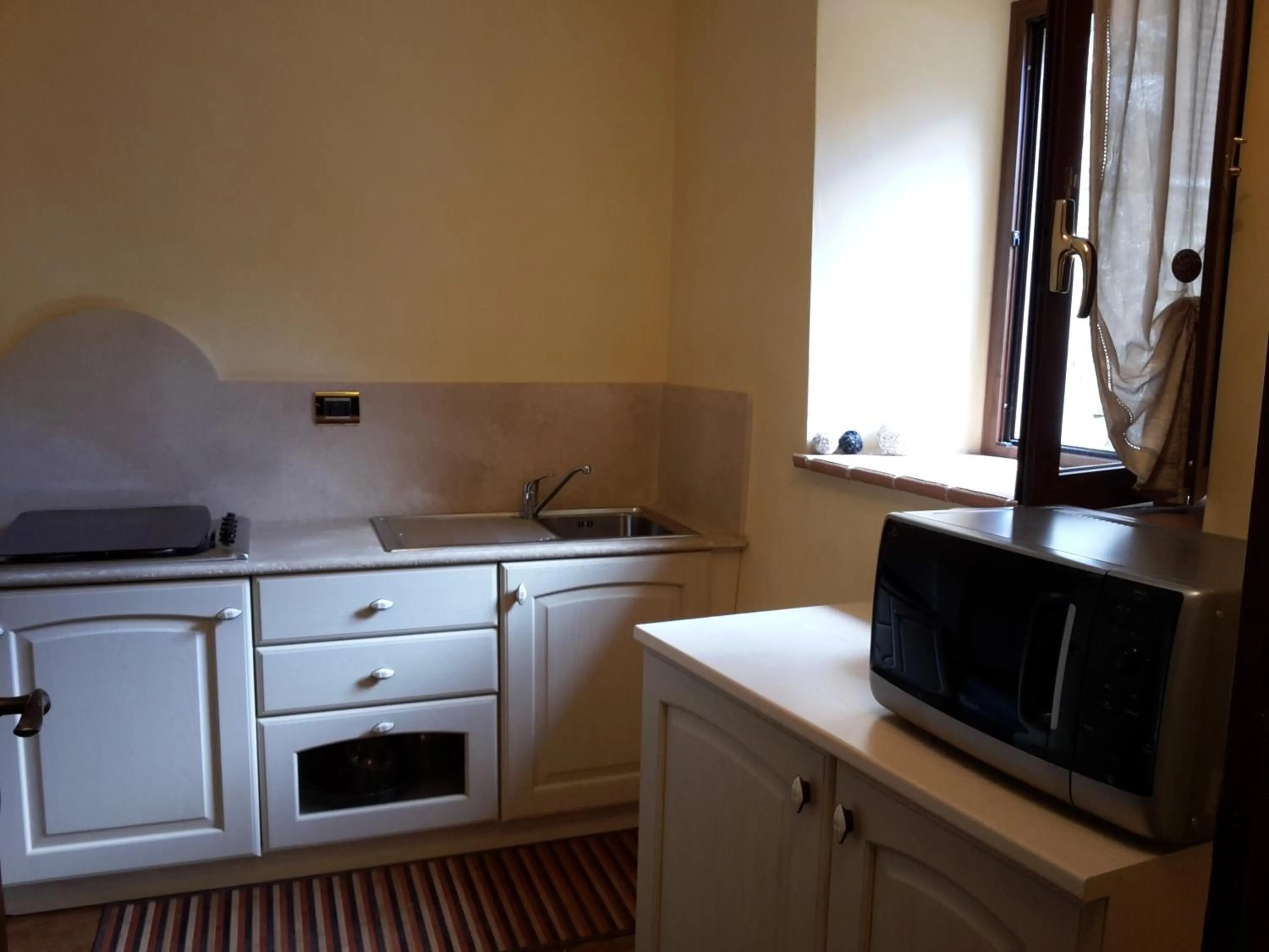 Kitchen or kitchenette in Castello Izzalini Todi Resort