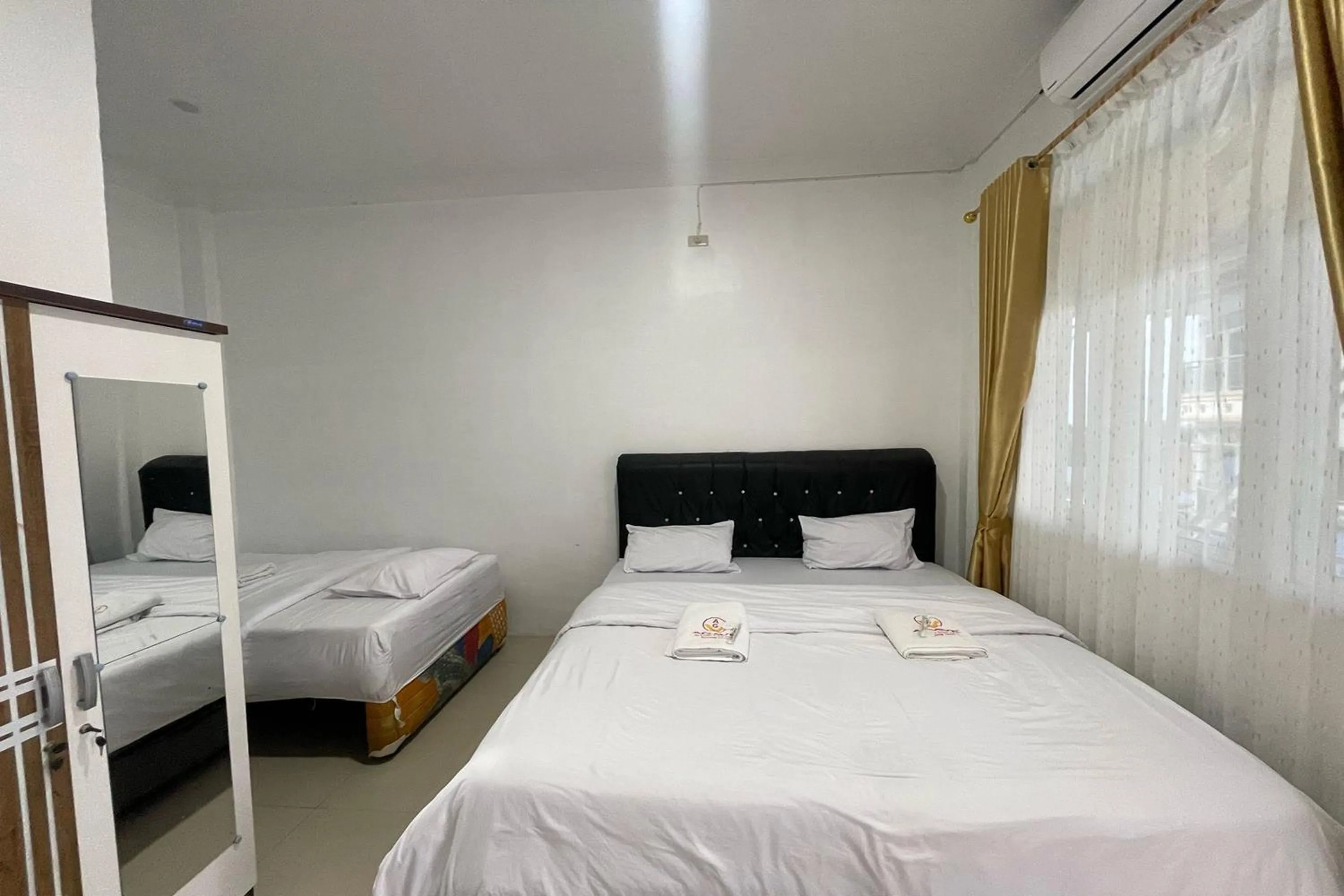Bed in Agave Hotel Siantar