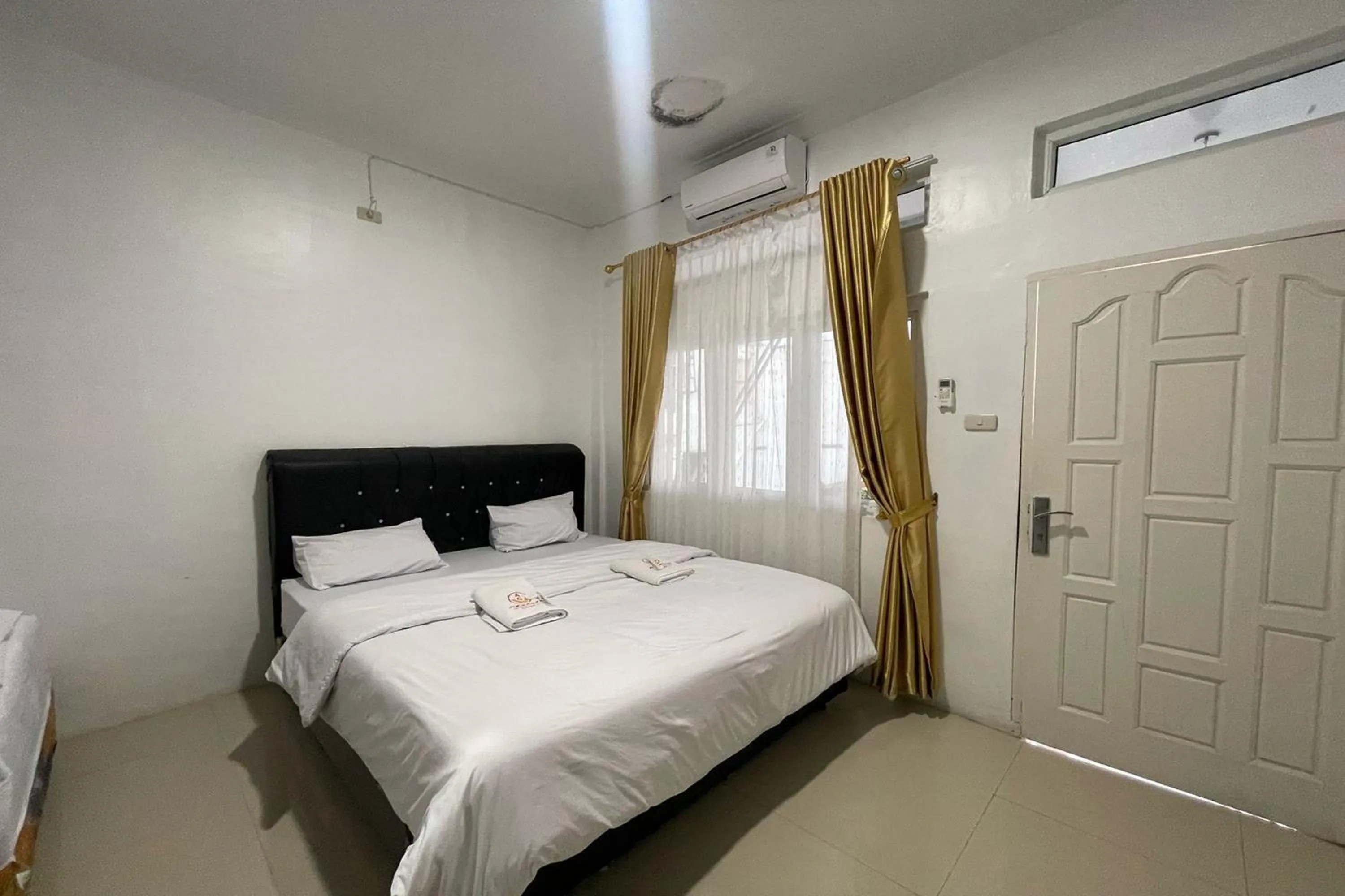 Bed in Agave Hotel Siantar