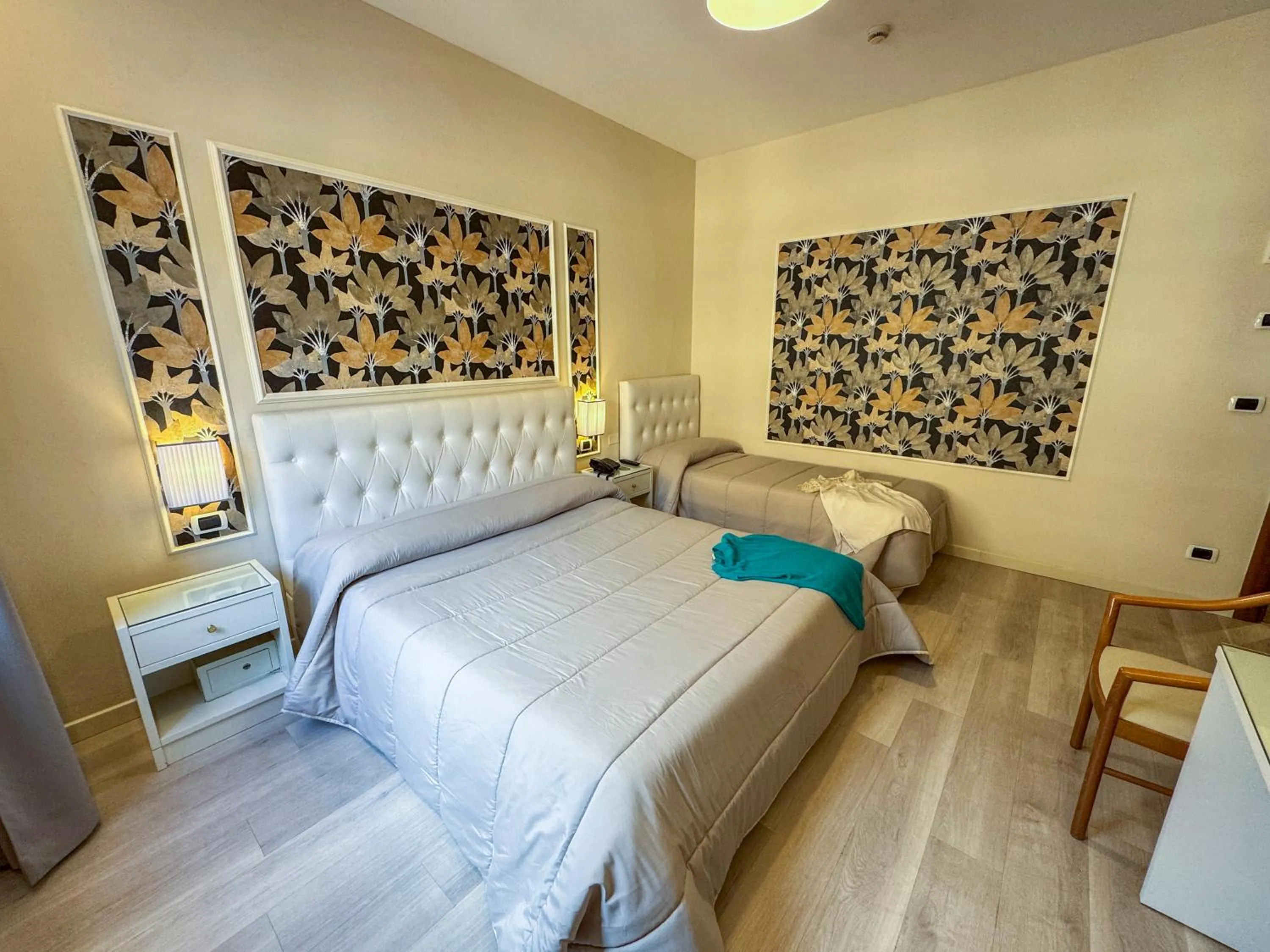 Decorative detail, Bed in Hotel Ariston & Spa