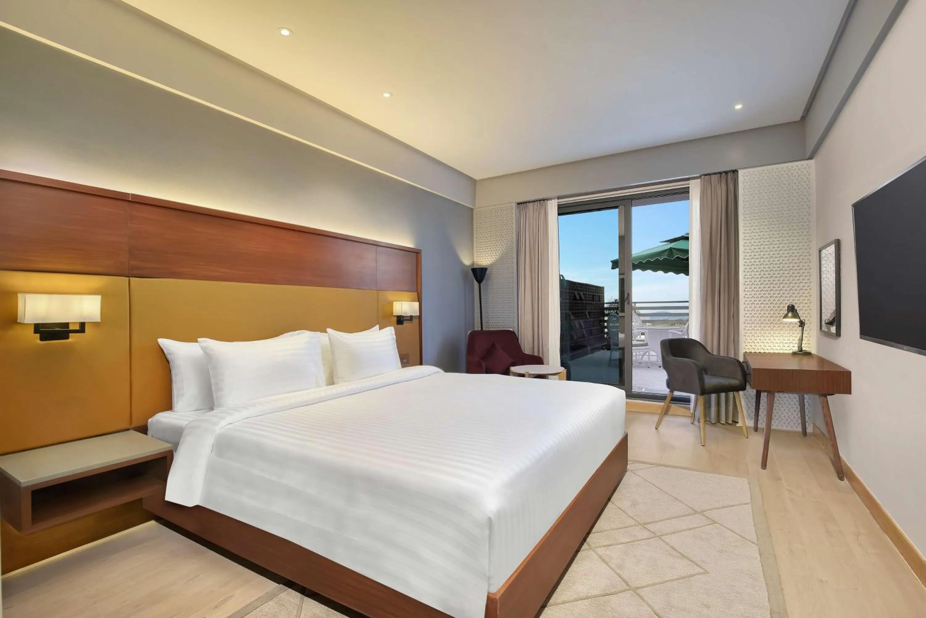 Photo of the whole room, Bed in Radisson Hotel Nathdwara