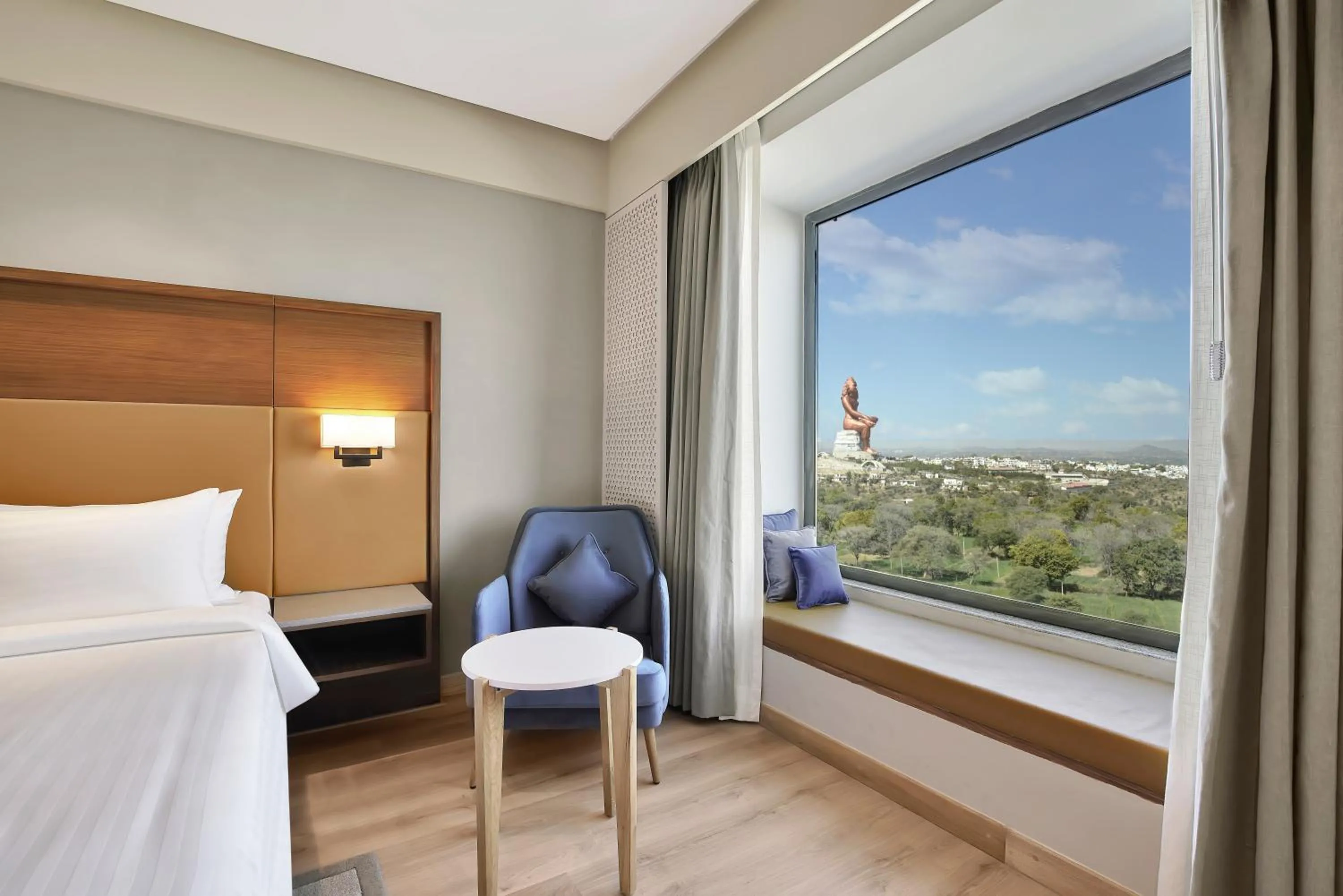 View (from property/room), Bed in Radisson Hotel Nathdwara