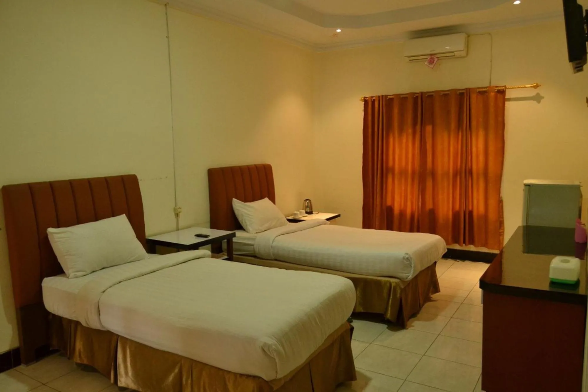 Bed in Malibou Hotel Medan