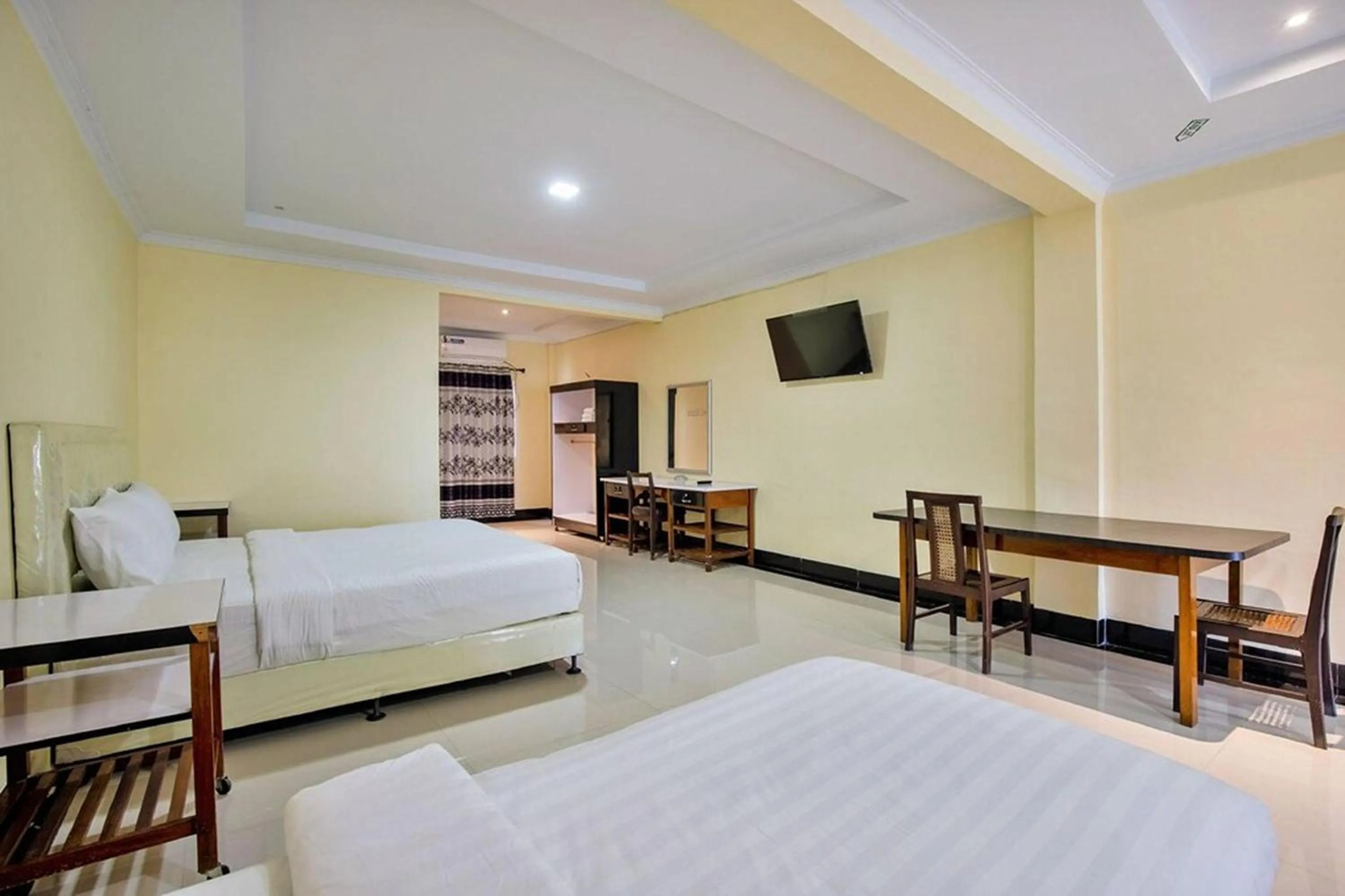 Bed in Malibou Hotel Medan