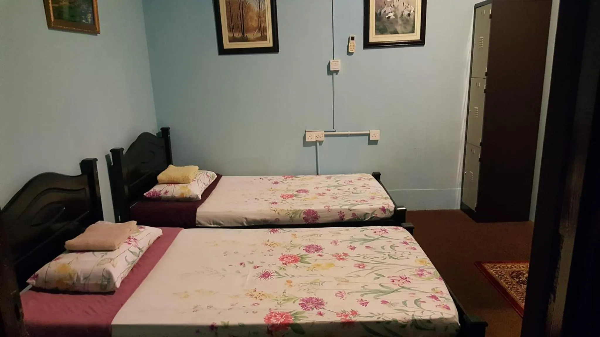 Bed in Marco Polo Guest House