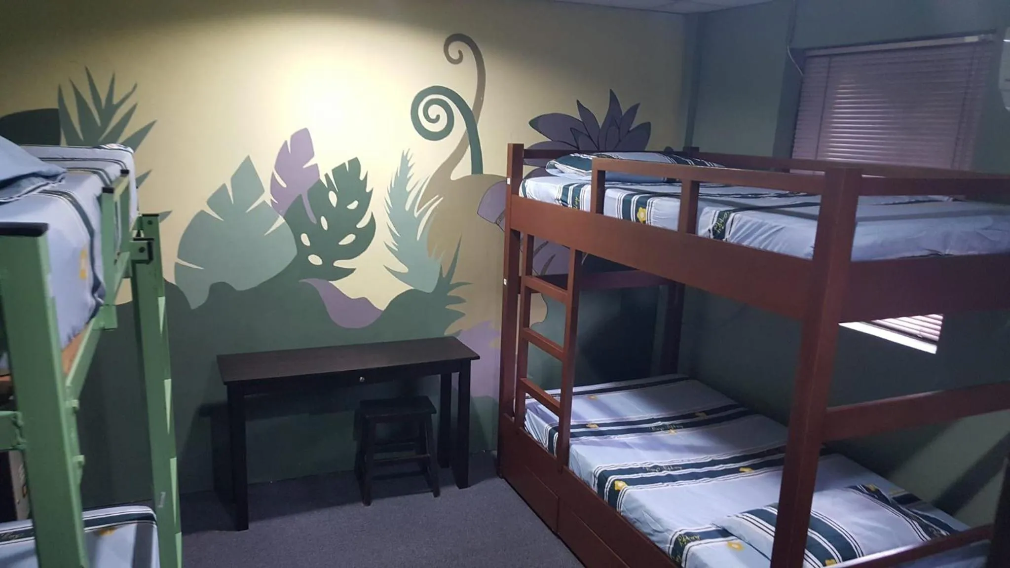 Bed in Marco Polo Guest House
