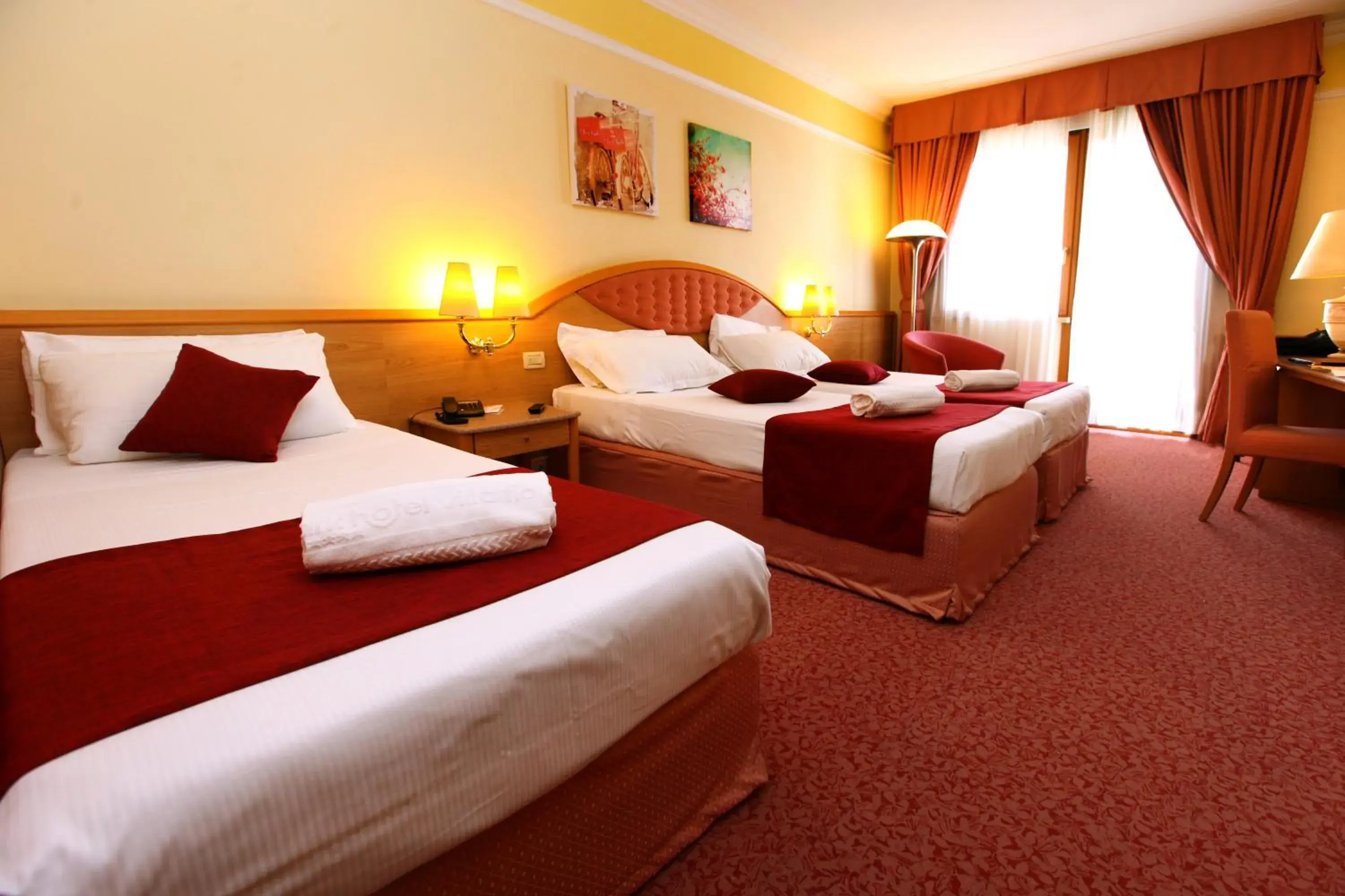 Classic Triple Room in Villa Fiorita Classic Triple Room in Villa Fiorita