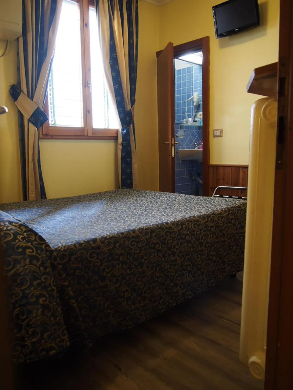 Photo of the whole room, Bed in Hotel Santa Croce