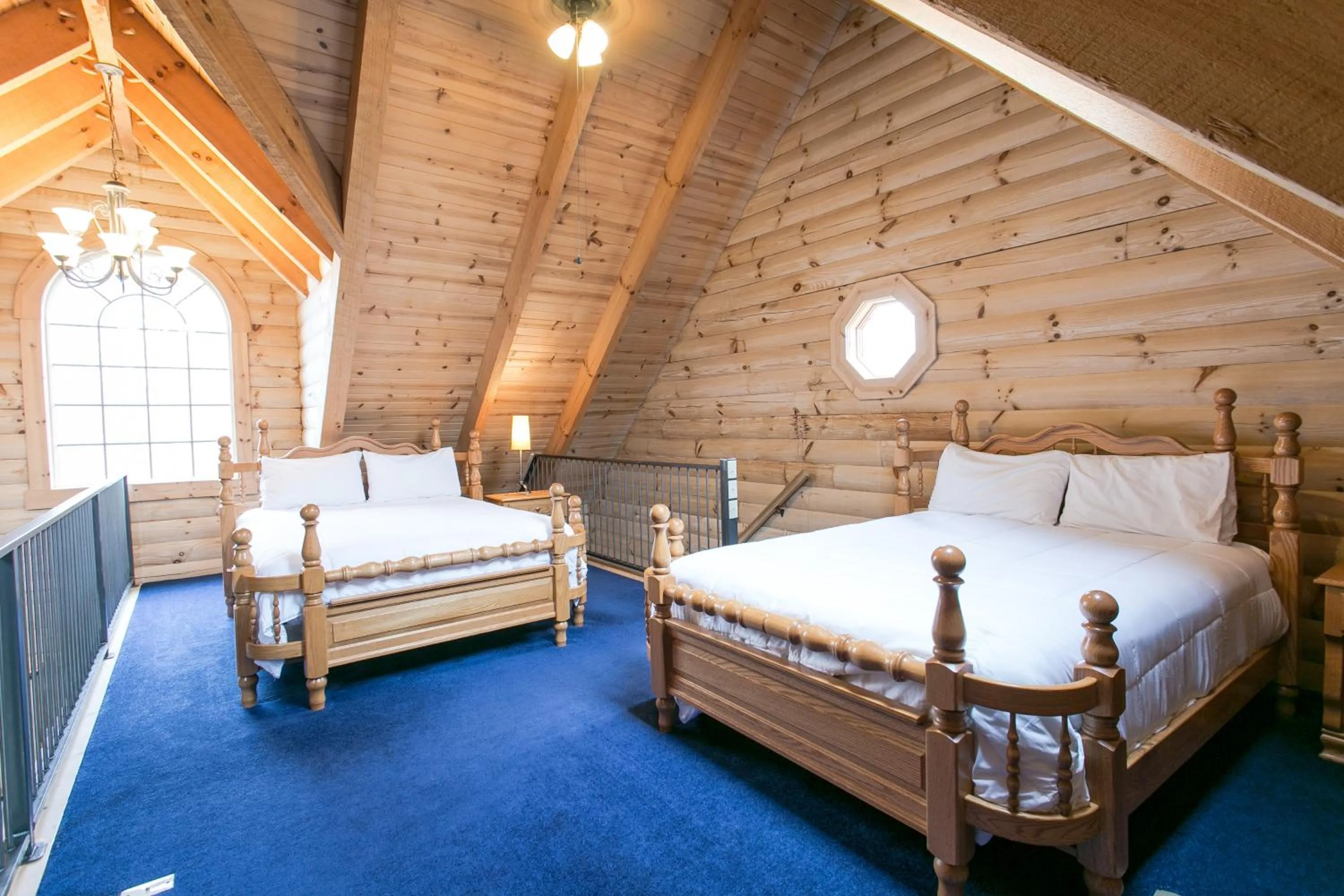 Bed in Blue Jays Nest Cabin by Amish Country Lodging
