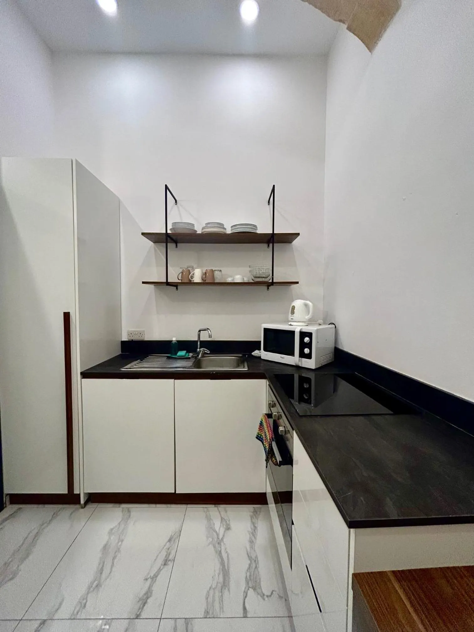 Kitchen or kitchenette in Tritoni Harbour suites - Valletta