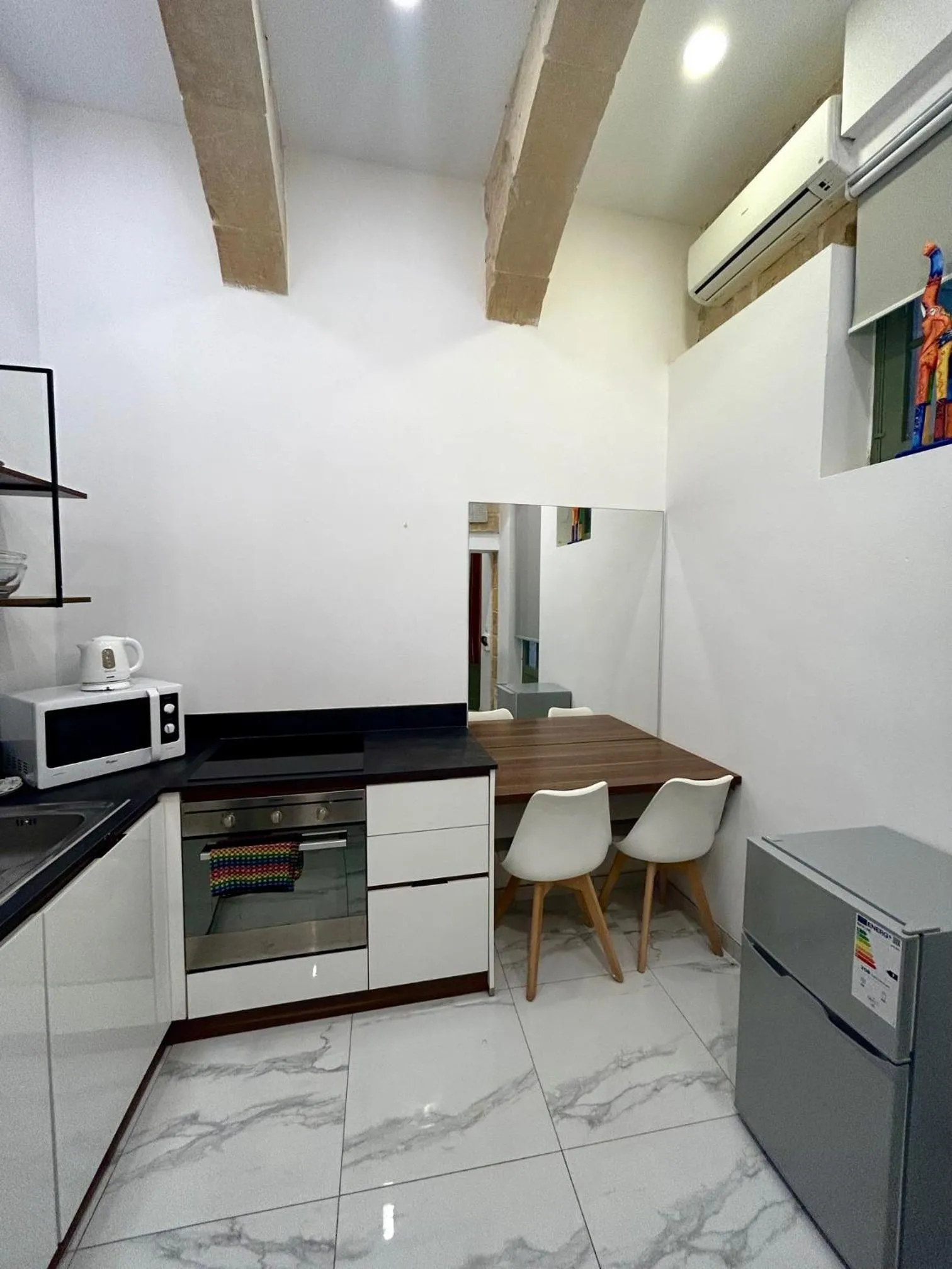 Kitchen or kitchenette in Tritoni Harbour suites - Valletta