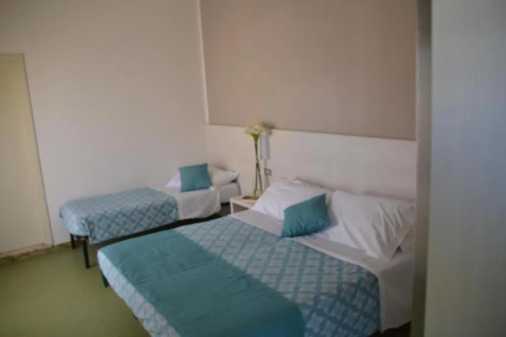 Bed in Hotel Michelangelo