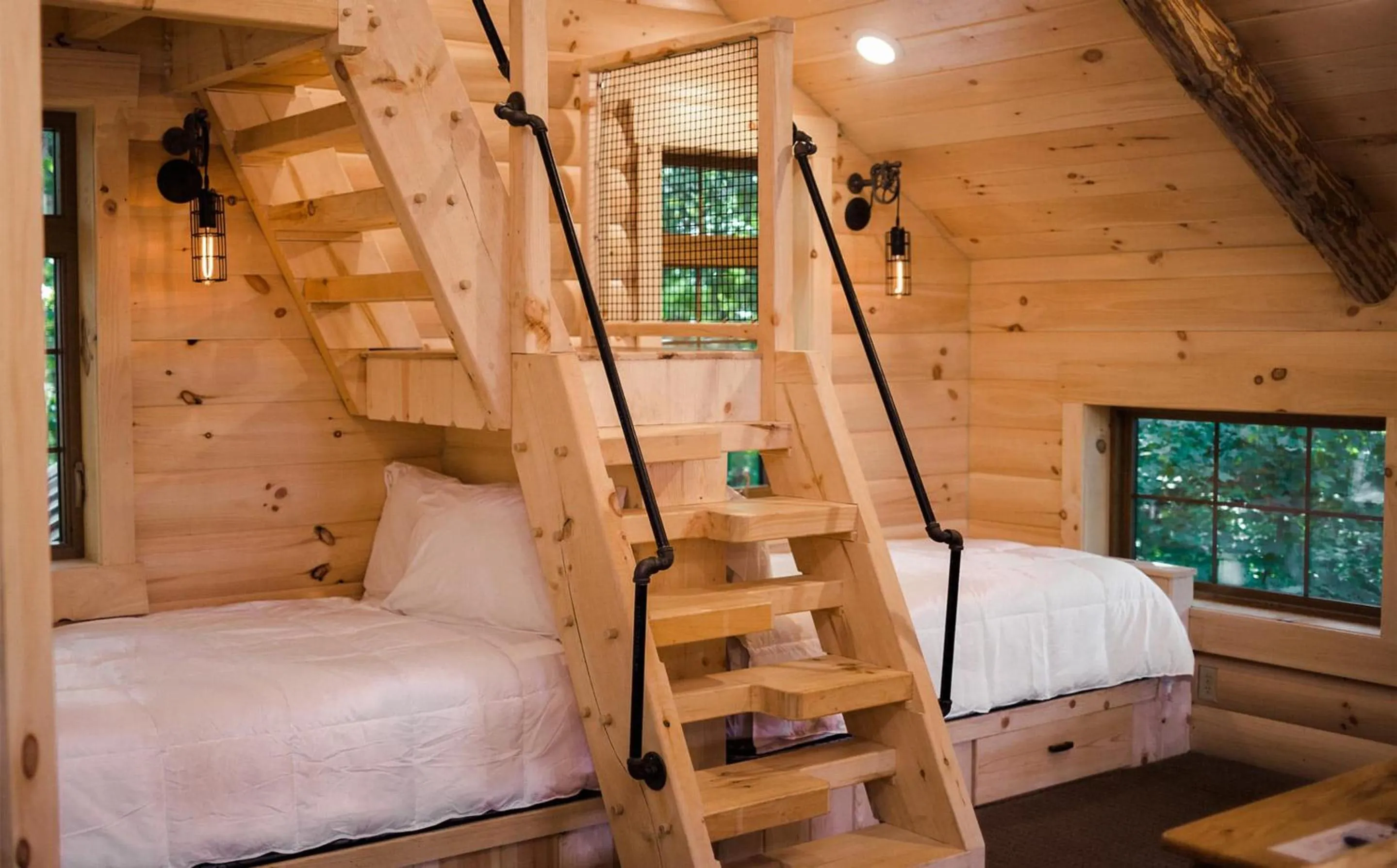 Bed in Treehouse #1 by Amish Country Lodging