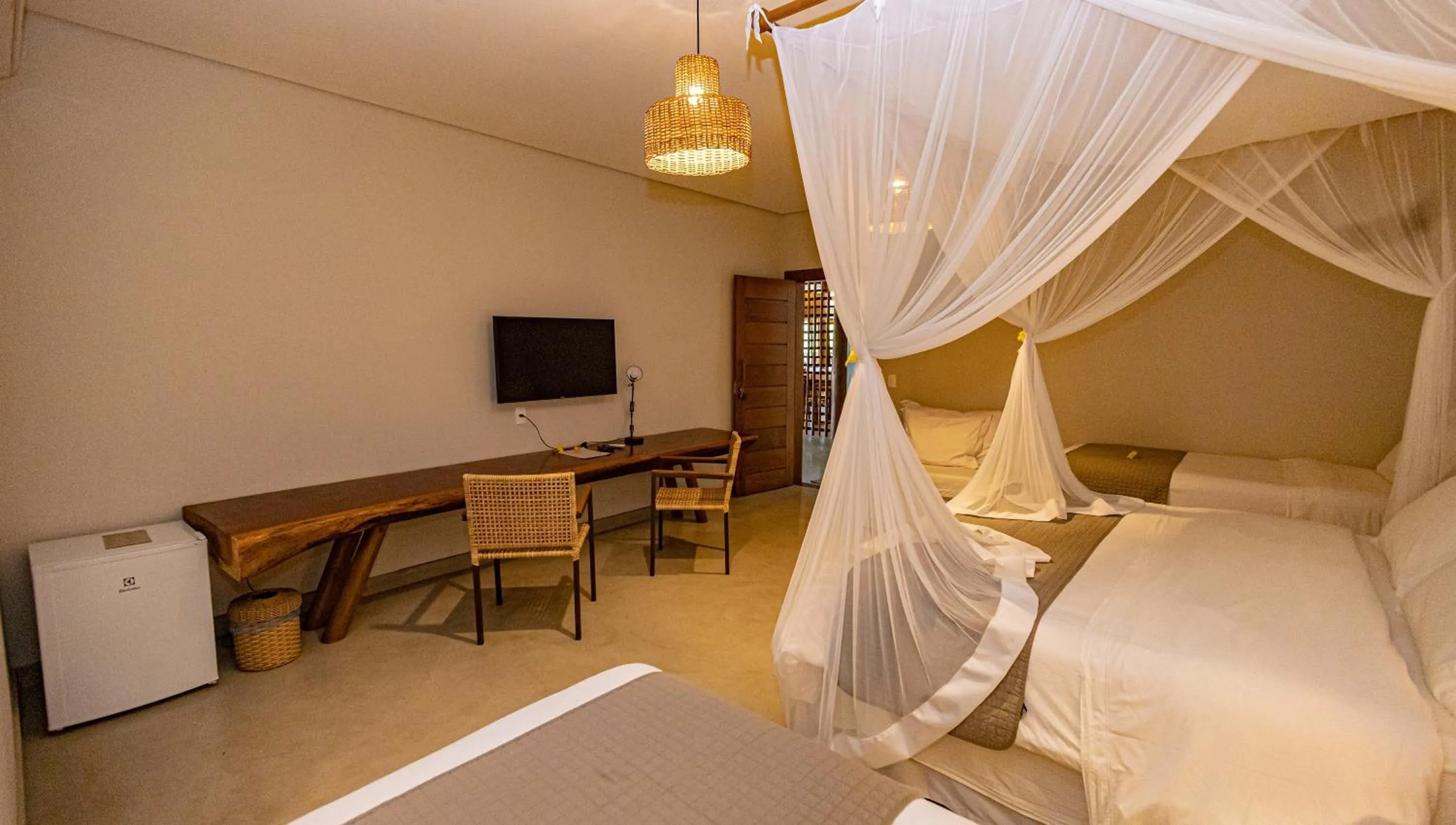 Bed in Aysú Trancoso Boutique Hotel