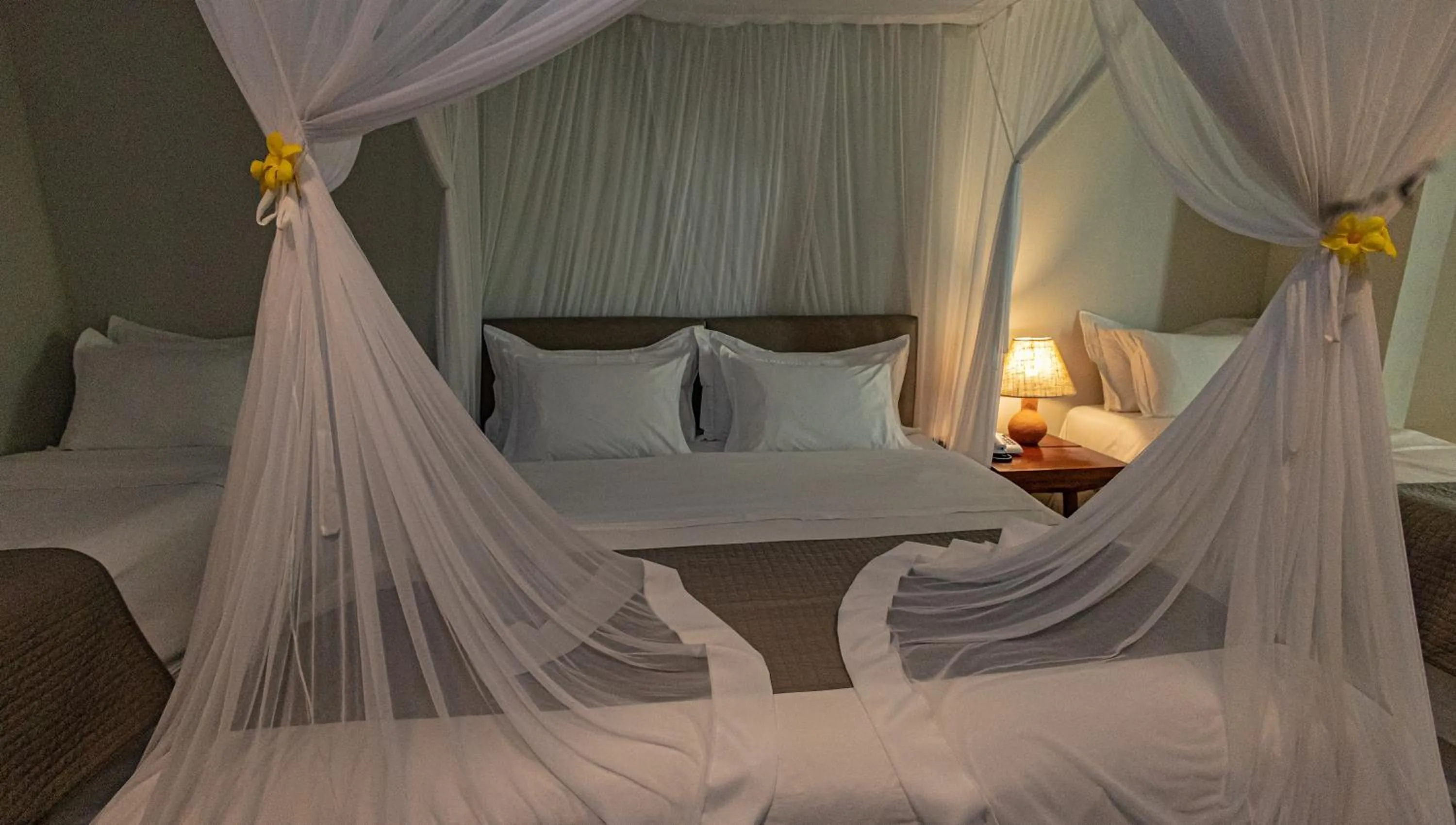 Bed in Aysú Trancoso Boutique Hotel