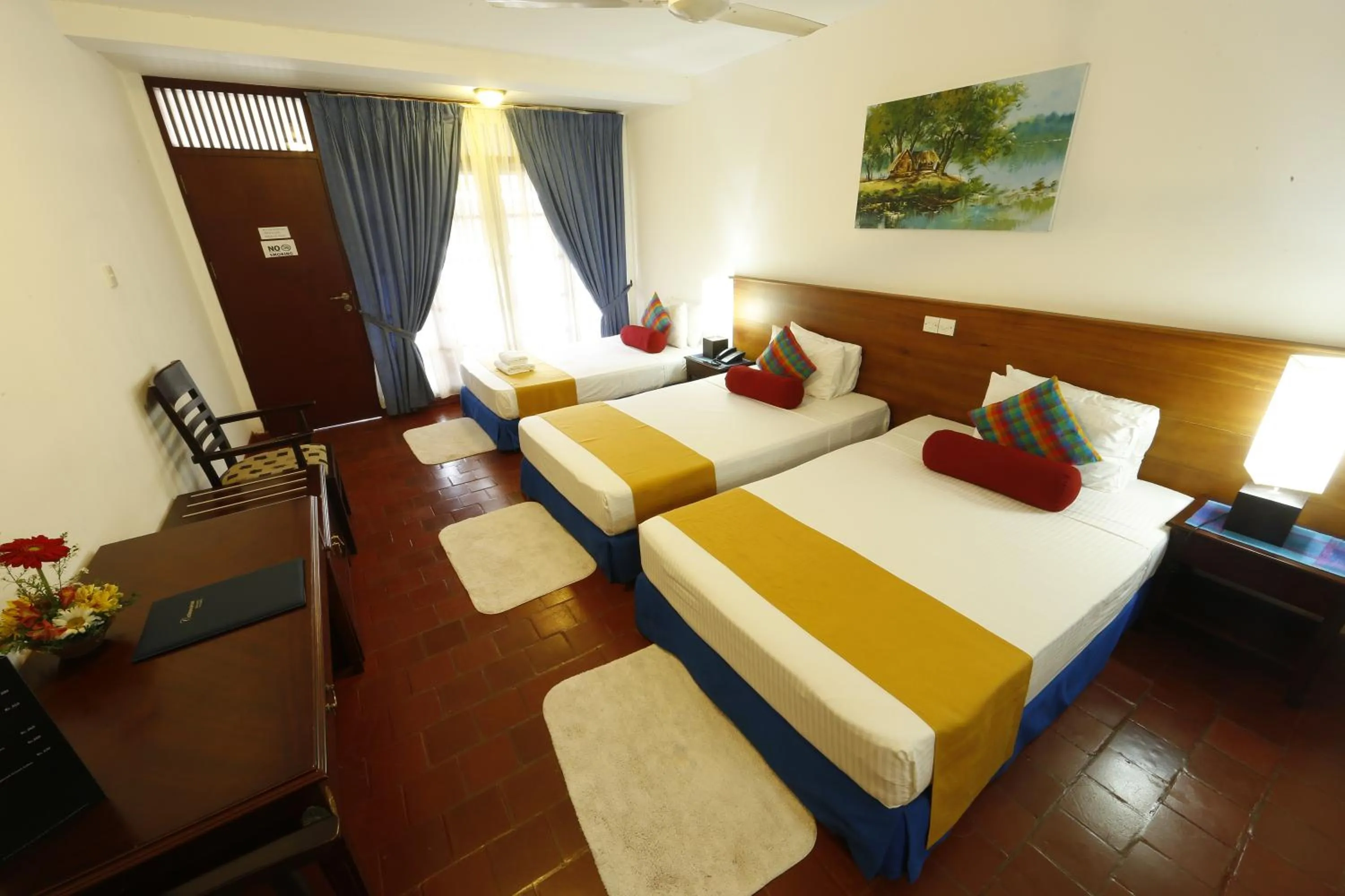 Photo of the whole room, Bed in Catamaran Beach Hotel