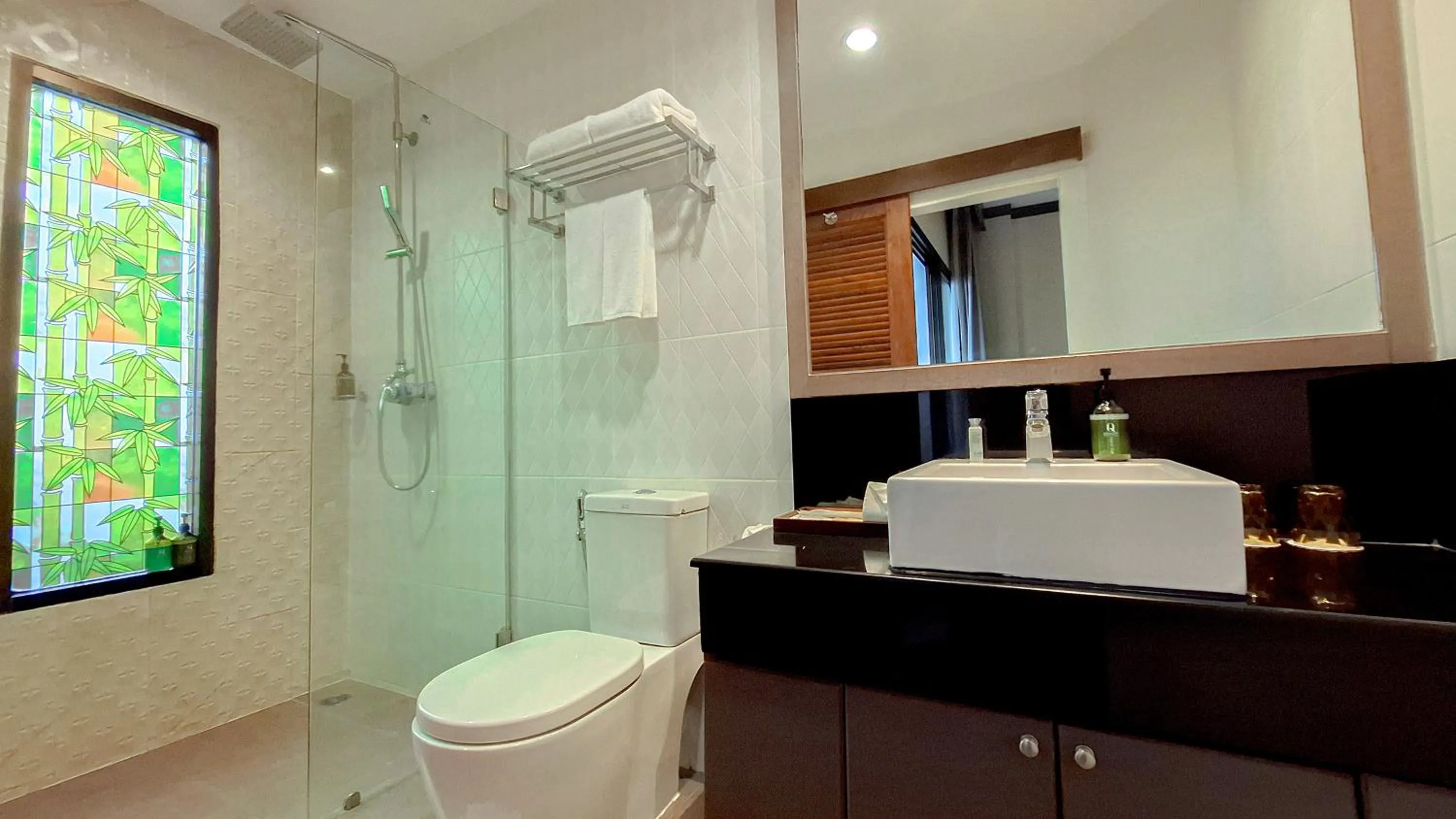 Shower in Quality Beach Resorts and Spa Patong