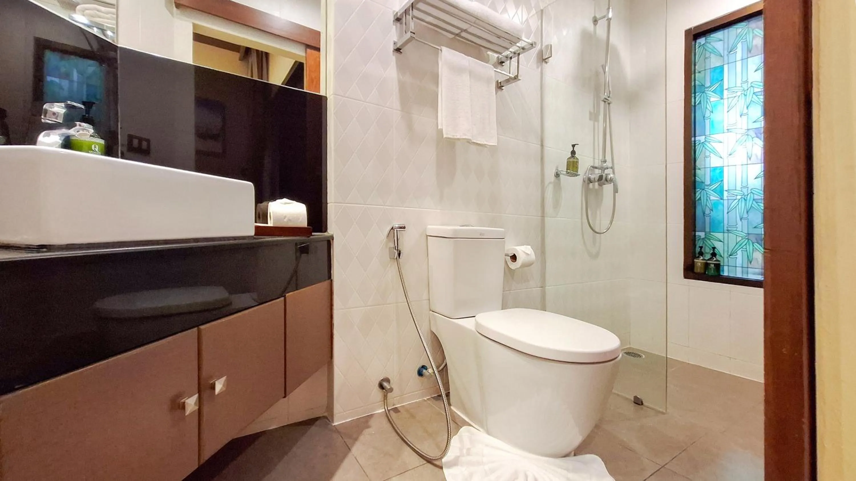 Shower in Quality Beach Resorts and Spa Patong