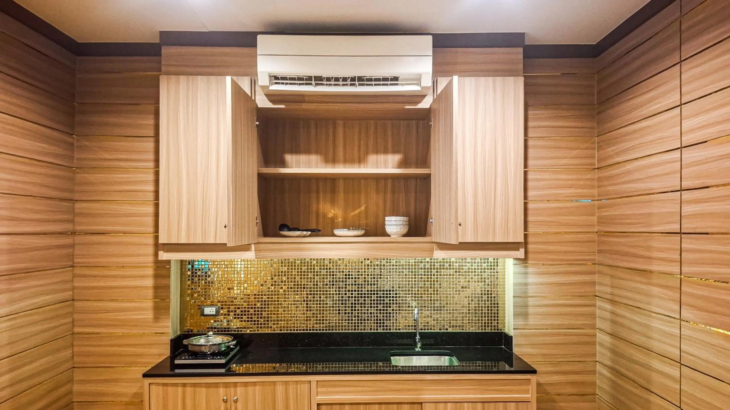 Kitchen or kitchenette in Quality Beach Resorts and Spa Patong