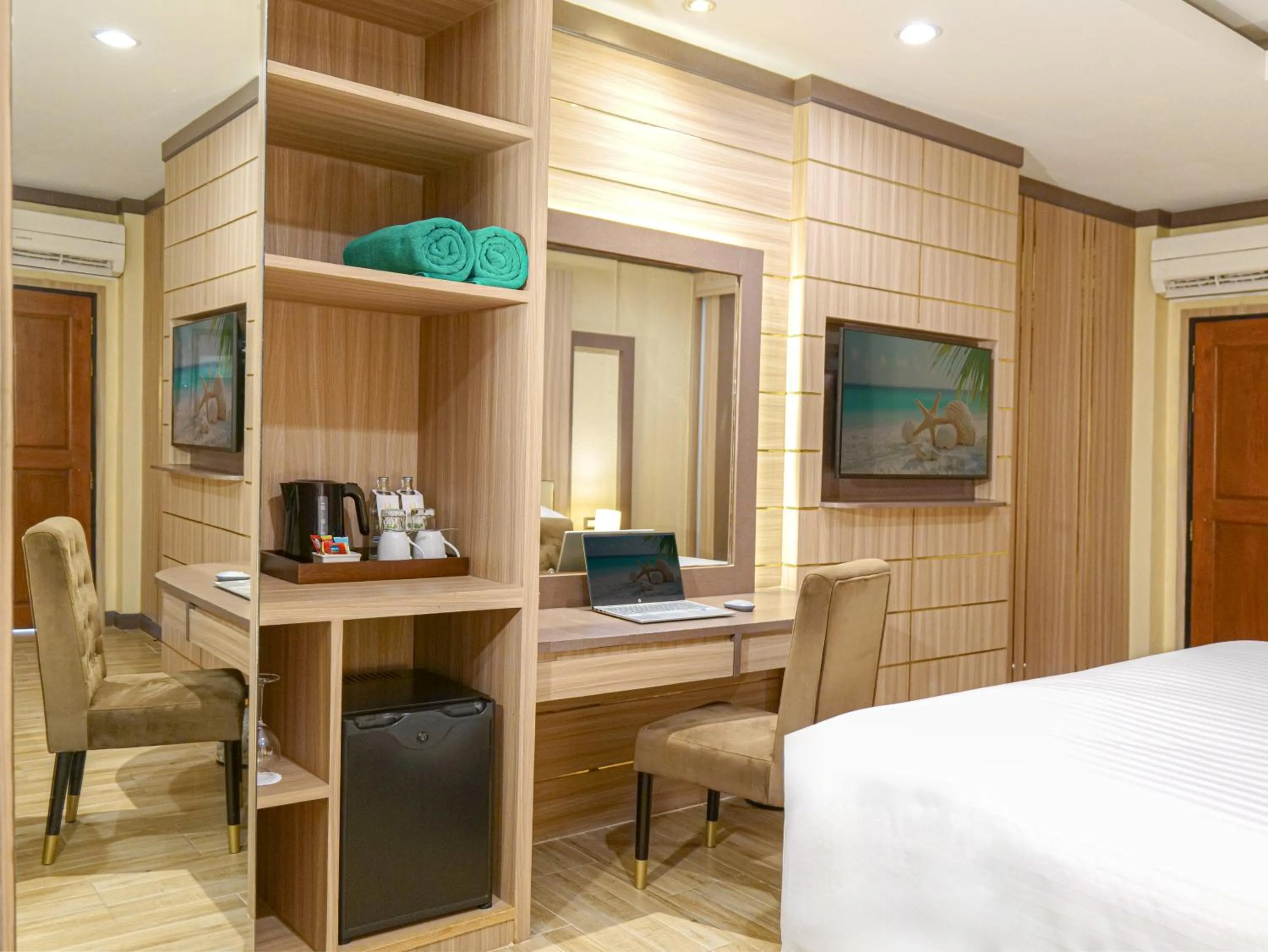 Bed in Quality Beach Resorts and Spa Patong