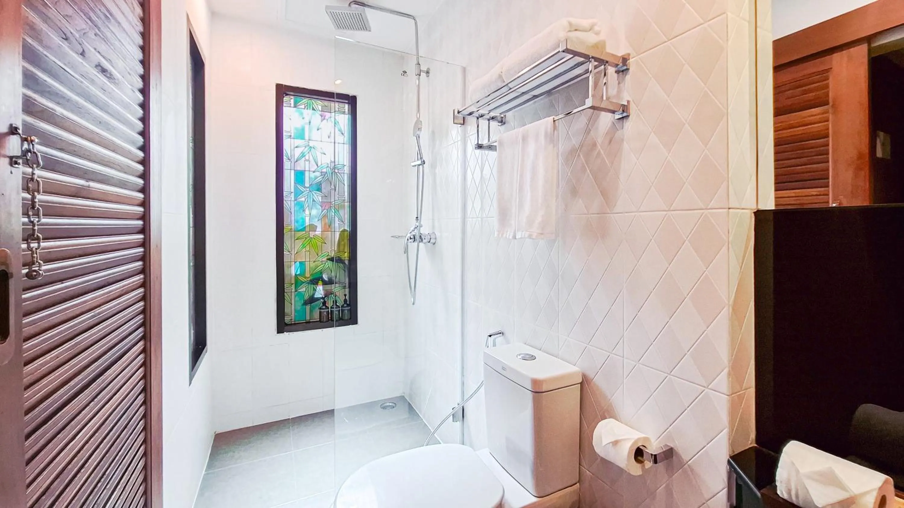 Shower in Quality Beach Resorts and Spa Patong