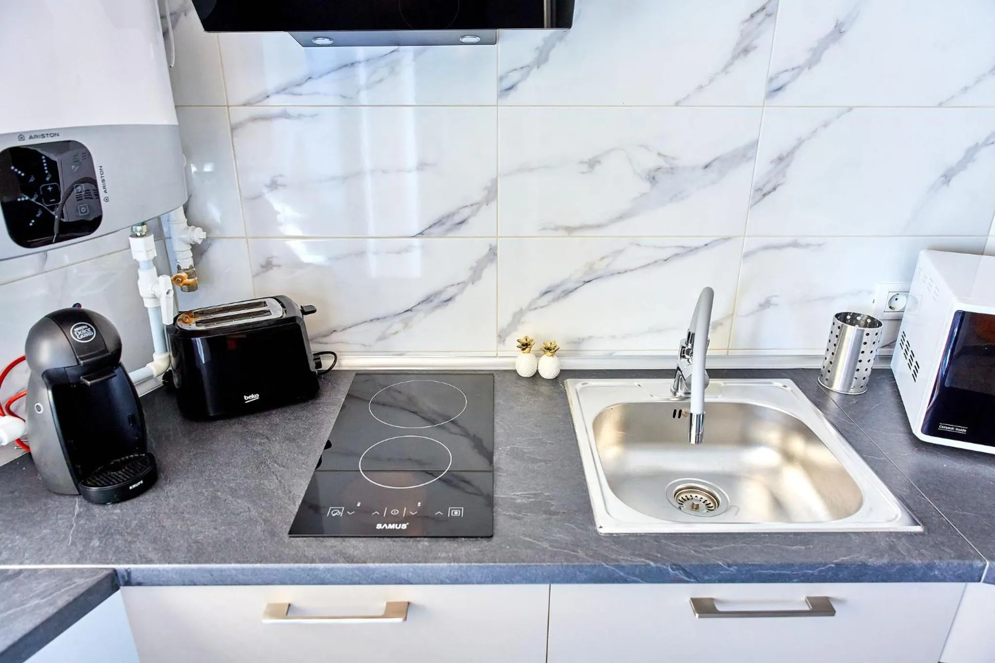 Kitchen or kitchenette in Apartamente by R S