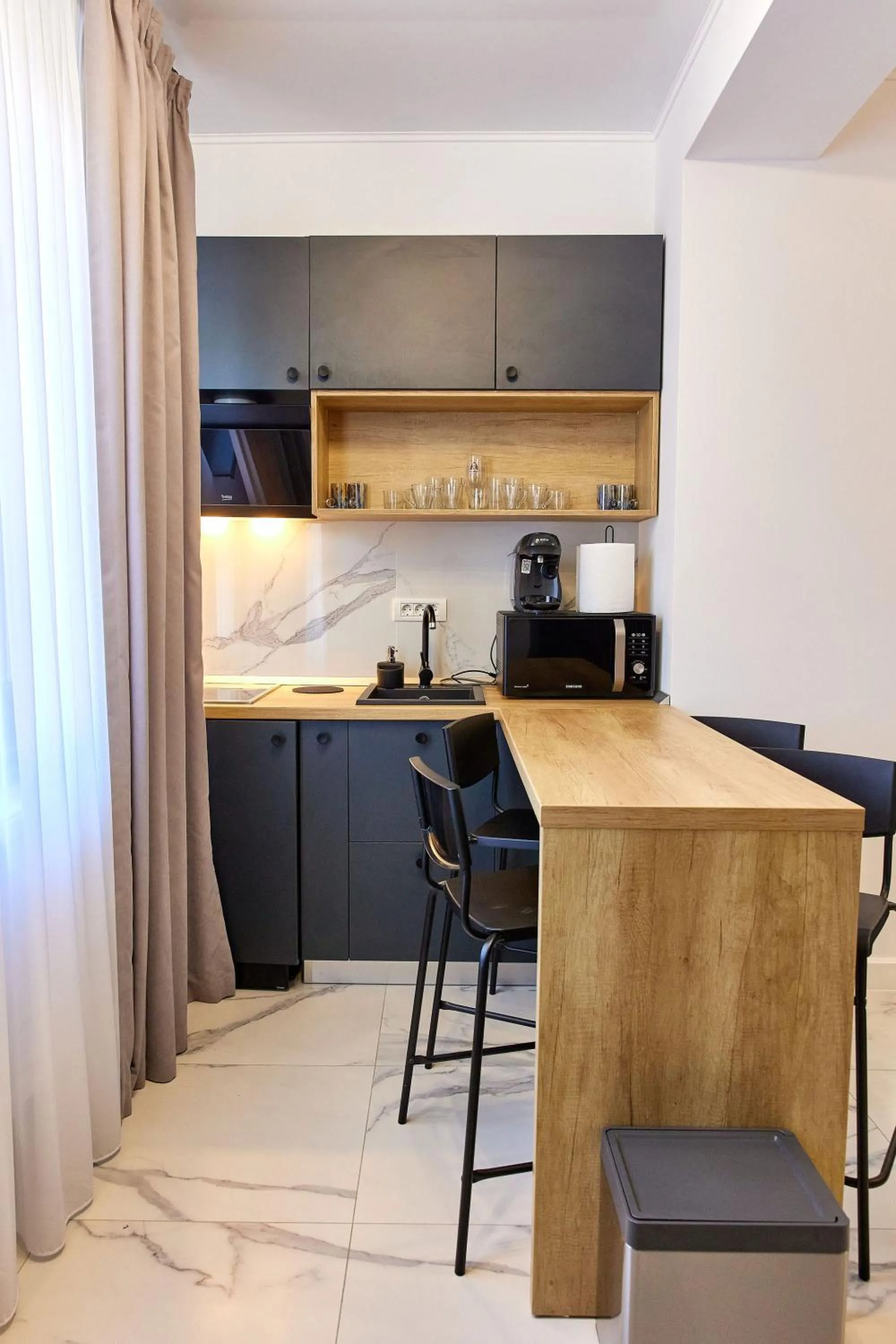 Kitchen or kitchenette in Apartamente by R S