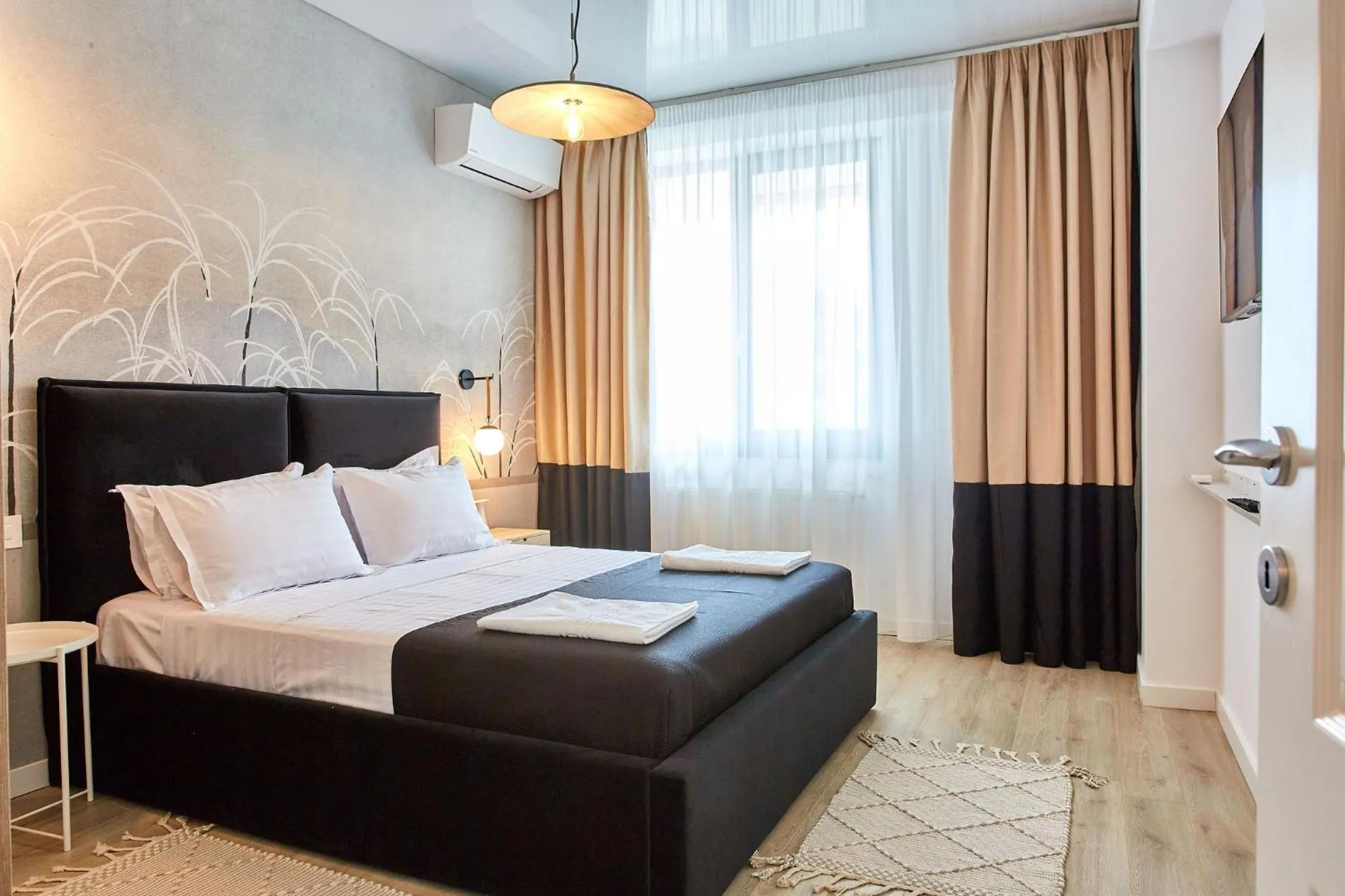 Bed in Apartamente by R S